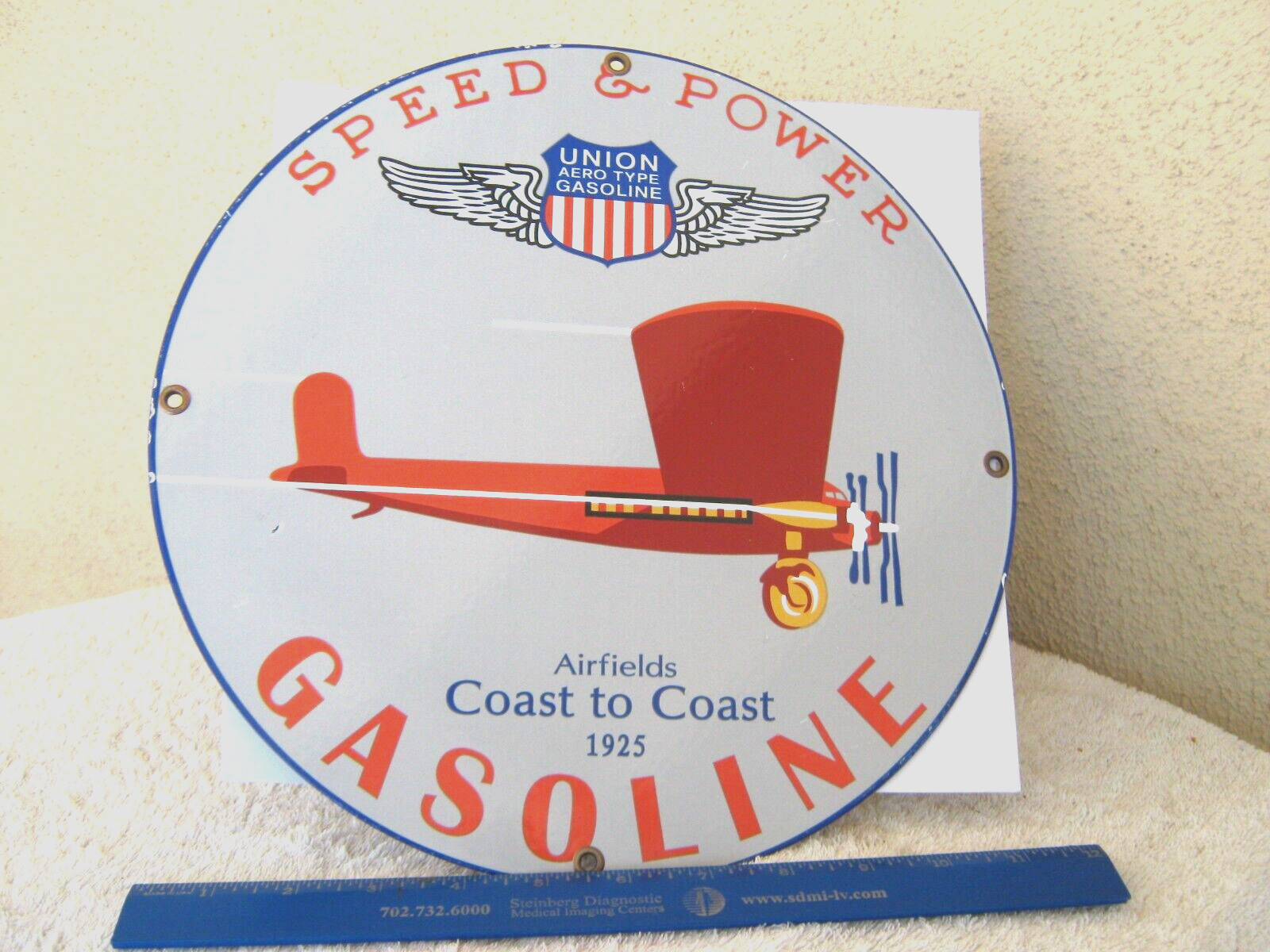 1925 Union Aero Type 12″ round gasoline sign, Speed & Power, outstanding art.
