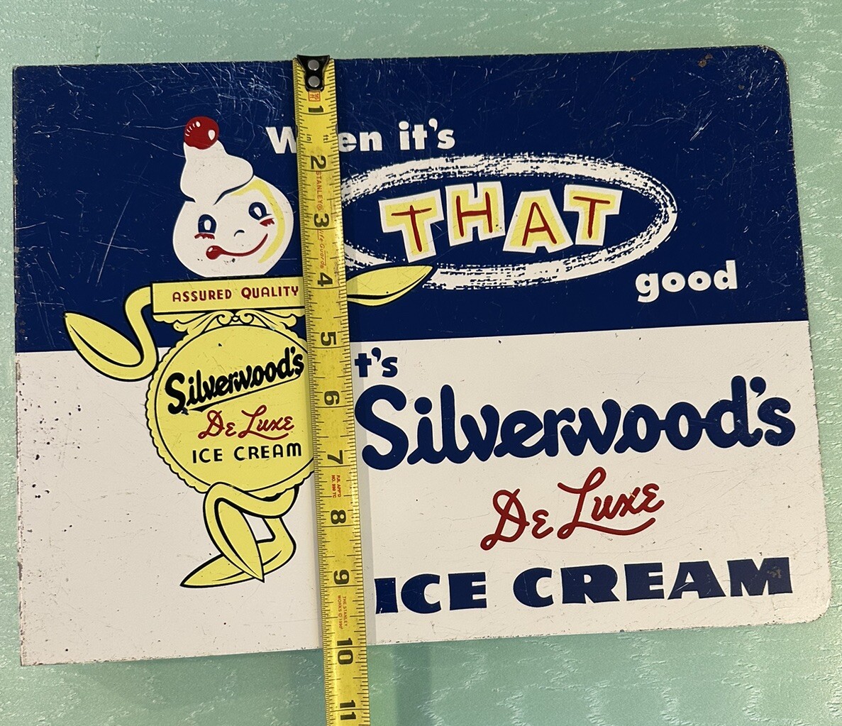 Silverwoods DeLuxe Ice Cream Painted Metal 2 Sided Flange Sign Stout Sign Co.