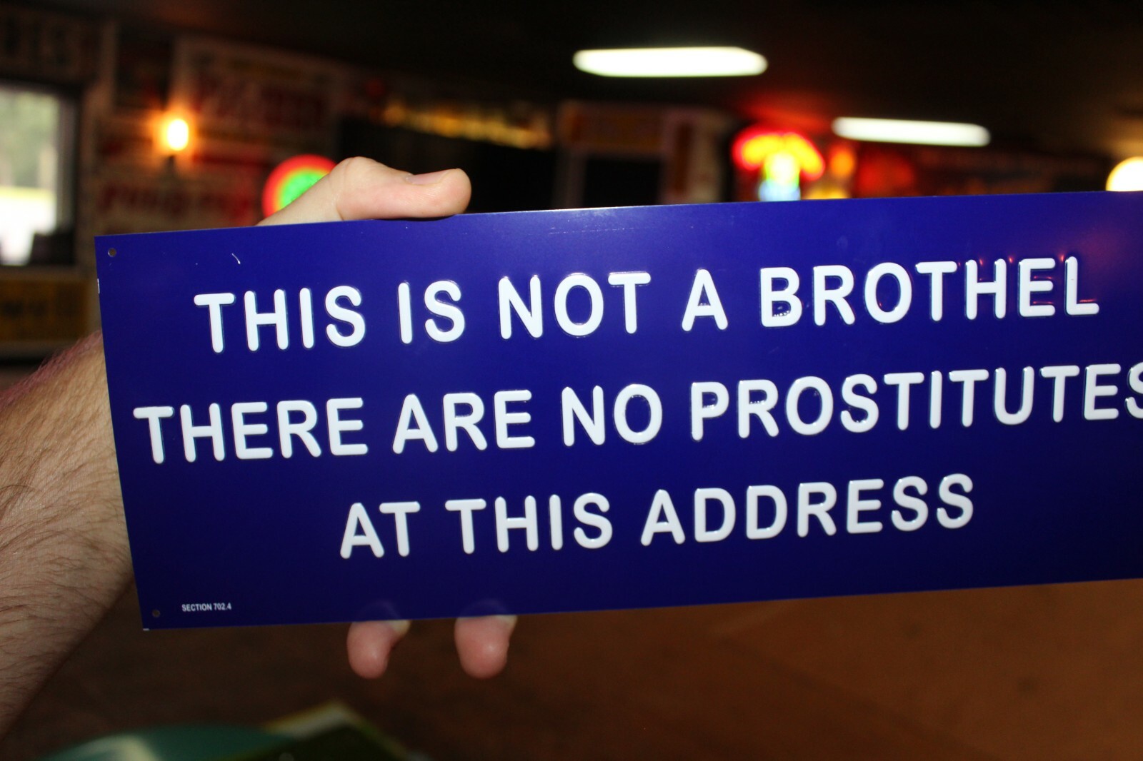 NOT A BROTHEL NO PROSTITUTES EMBOSSED METAL SIGN STRIP CLUB GAS OIL FUNNY HUMOR