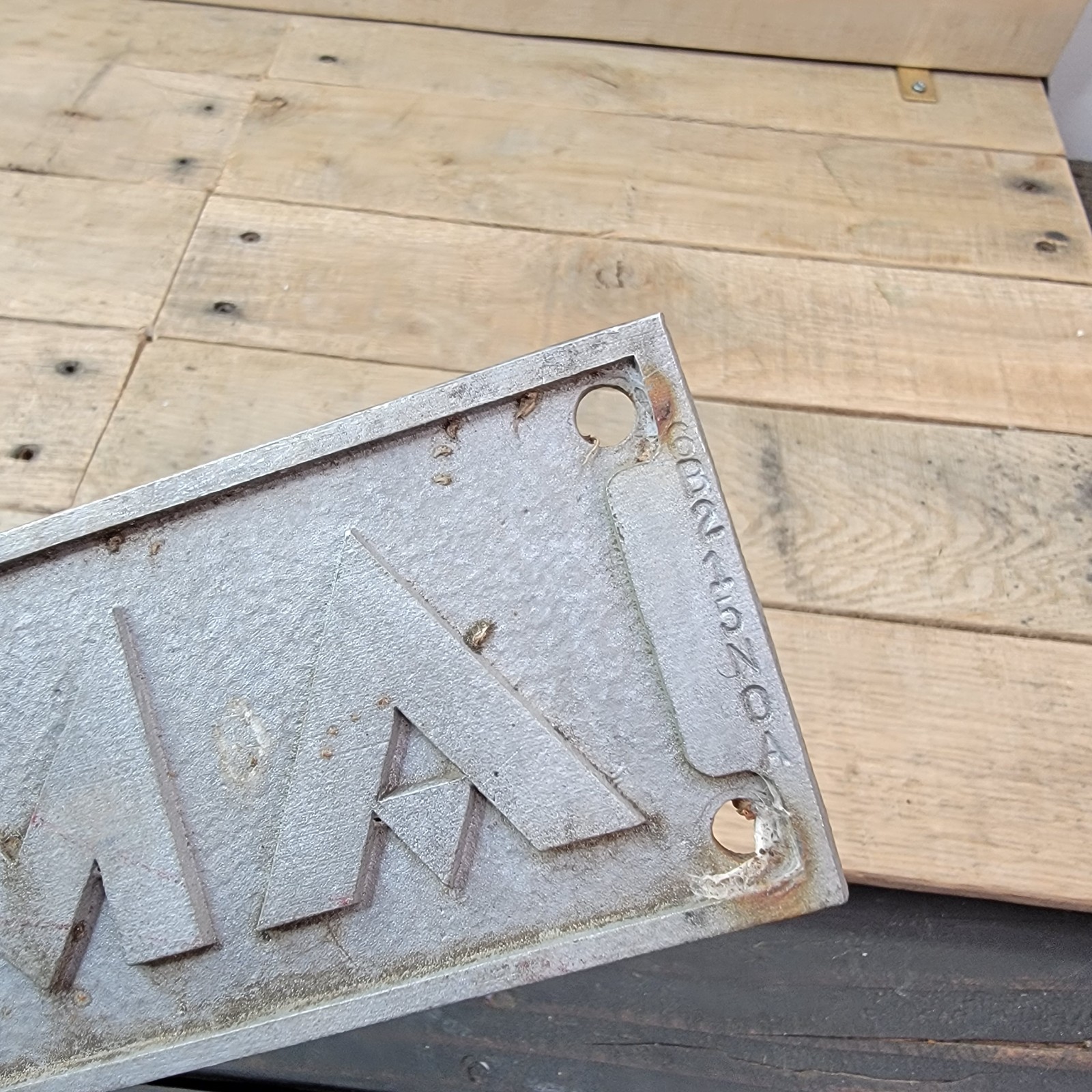 Vintage LOMA Cast Metal Industrial Sign Plate Embossed Gear Logo Plaque