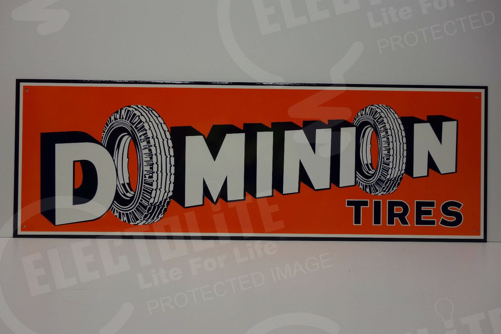 DOMINION TIRES DIE CUT STEEL ENAMEL SIGN UNIQUE 12″H X 36″W. GREAT COLORS!