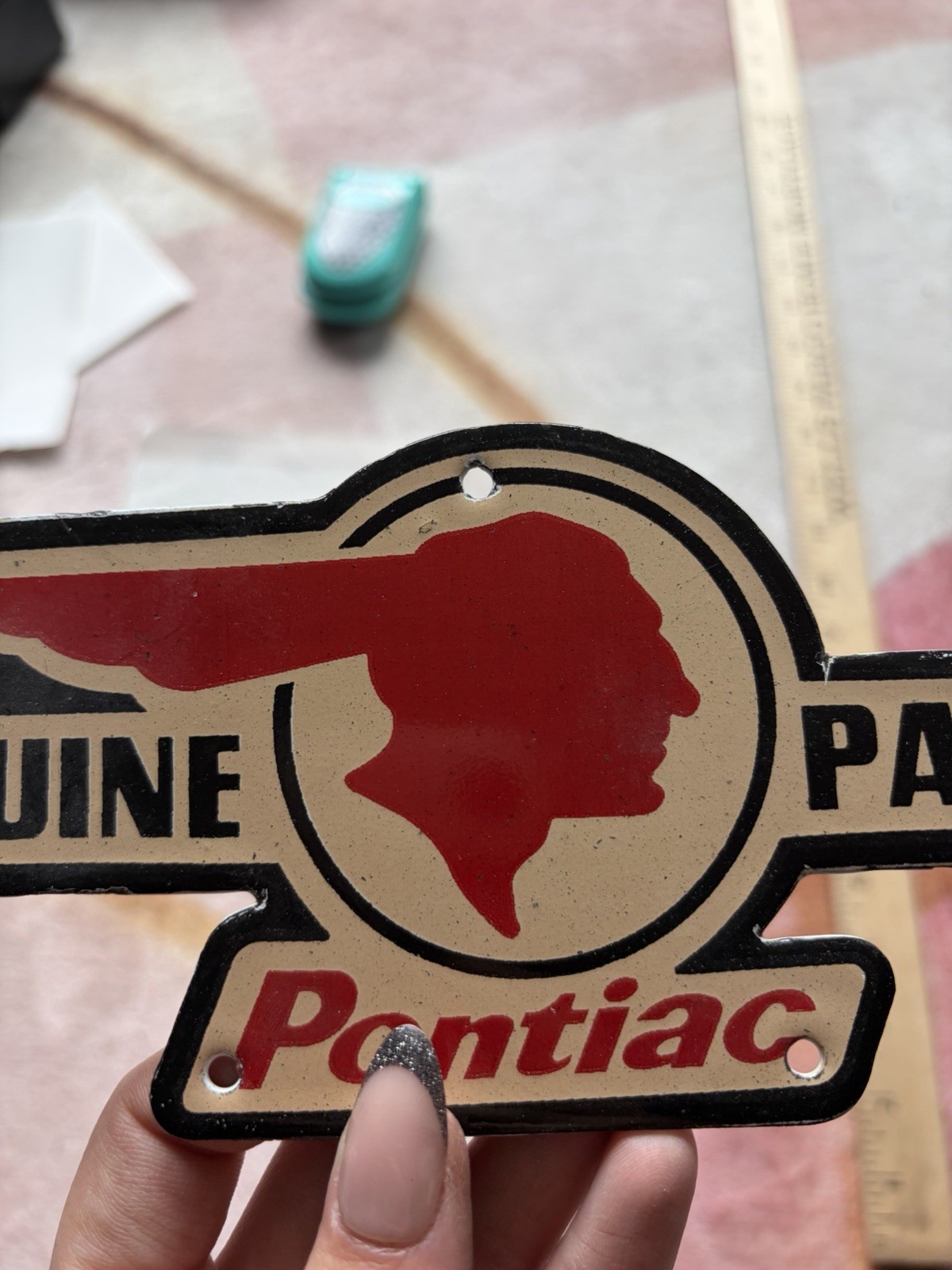 Porcelain Genuine Parts Pontiac Face Facing Right Sign