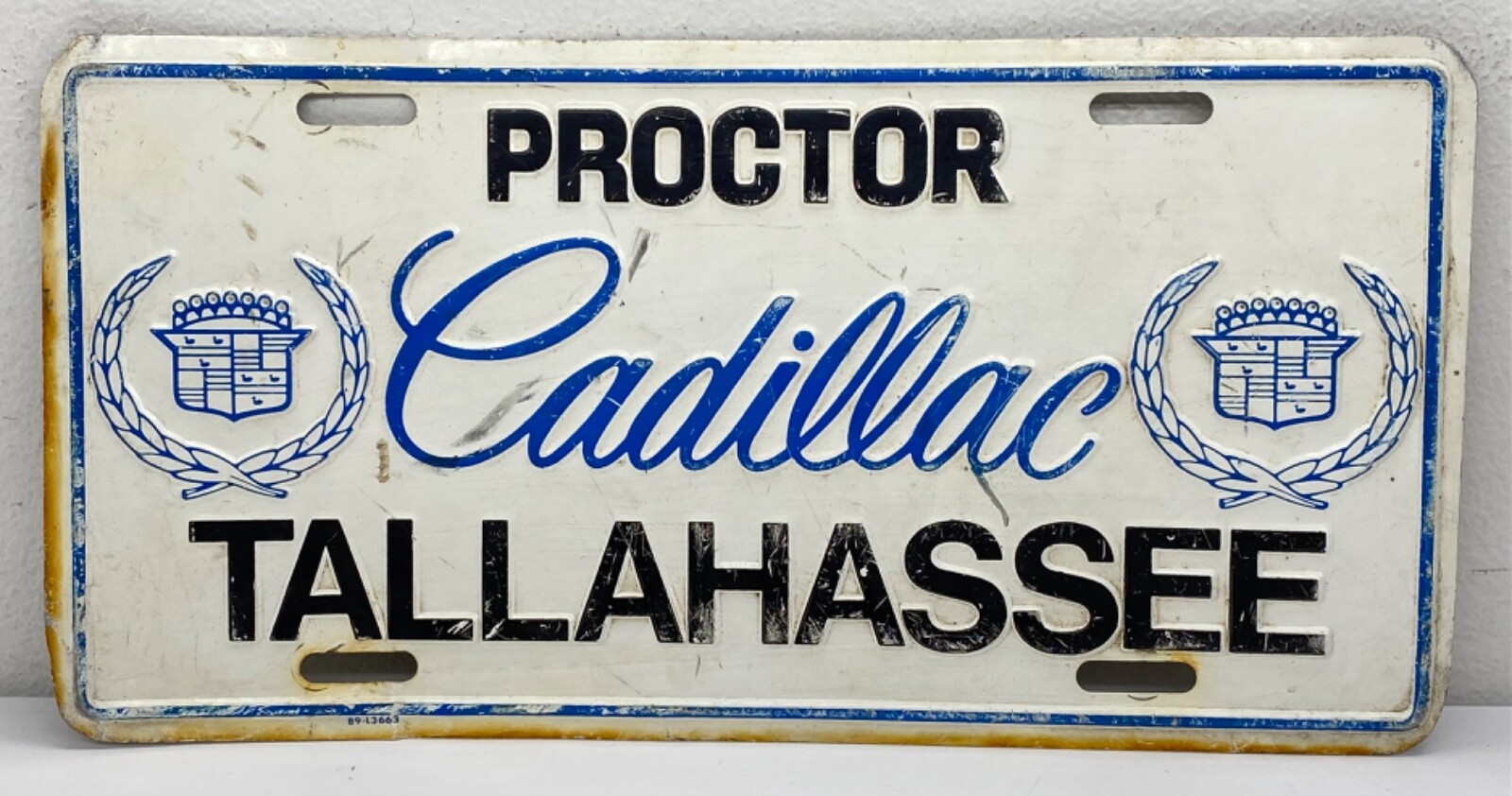 Vintage 80’s Cadillac Proctor Tallahassee Novelty License Plate Metal Emblem USA
