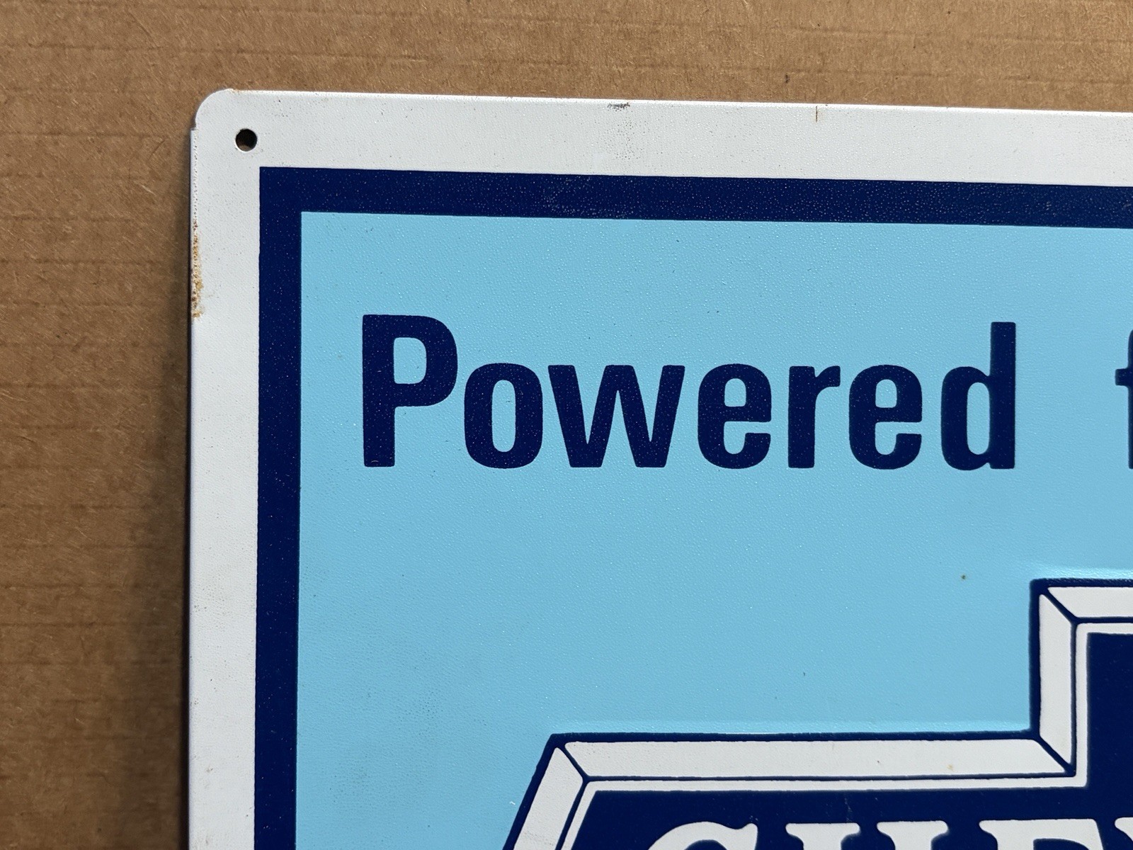 Chevrolet Powered for Performance Embossed Bowtie Metal Sign – 17-3/4″ x 11-3/4″
