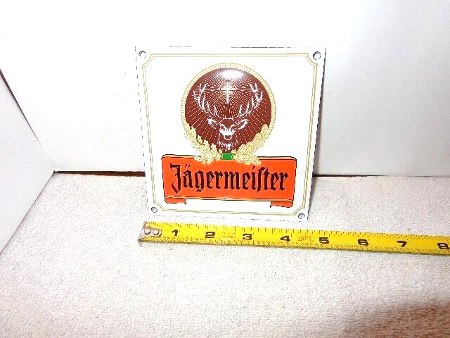 4 5/8 x 4 5/8 in JAGERMEISTER ADVERTISING SIGN DIE CUT METAL PORCELAIN – Z 331