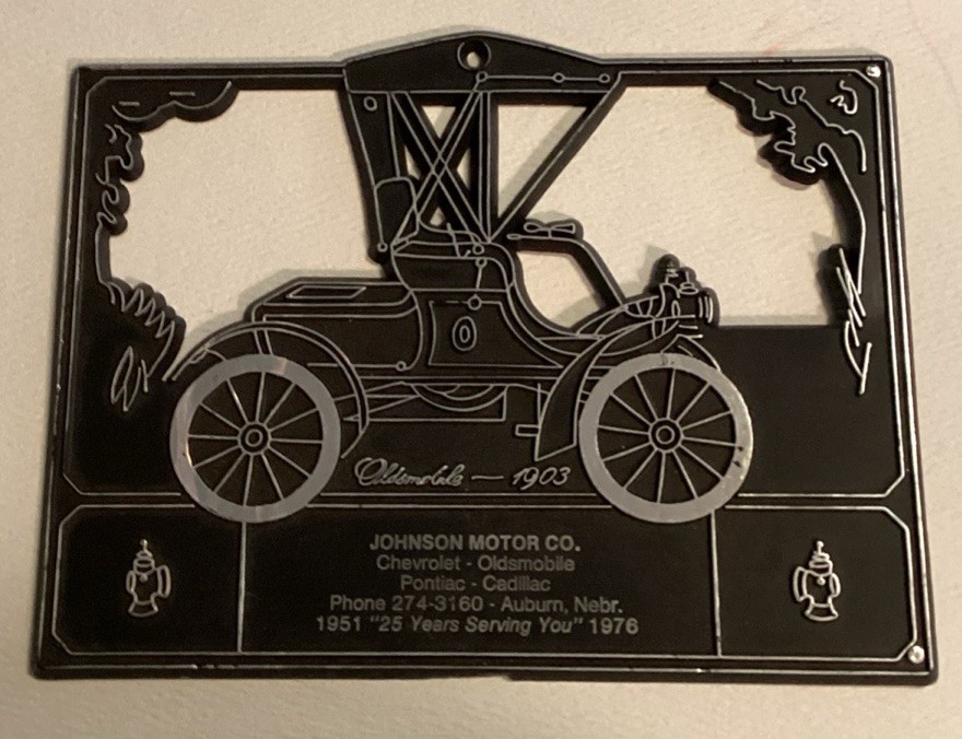 Johnson Motor Co. Auburn, Nebr. “Oldsmobile 1903” Plastic Calendar Topper/Sign