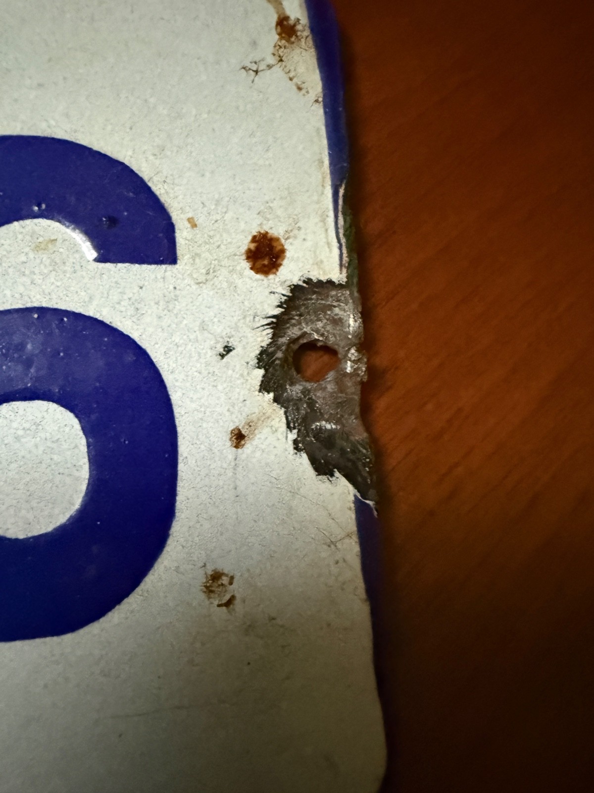 Vintage porcelain enamel metal sign “16”