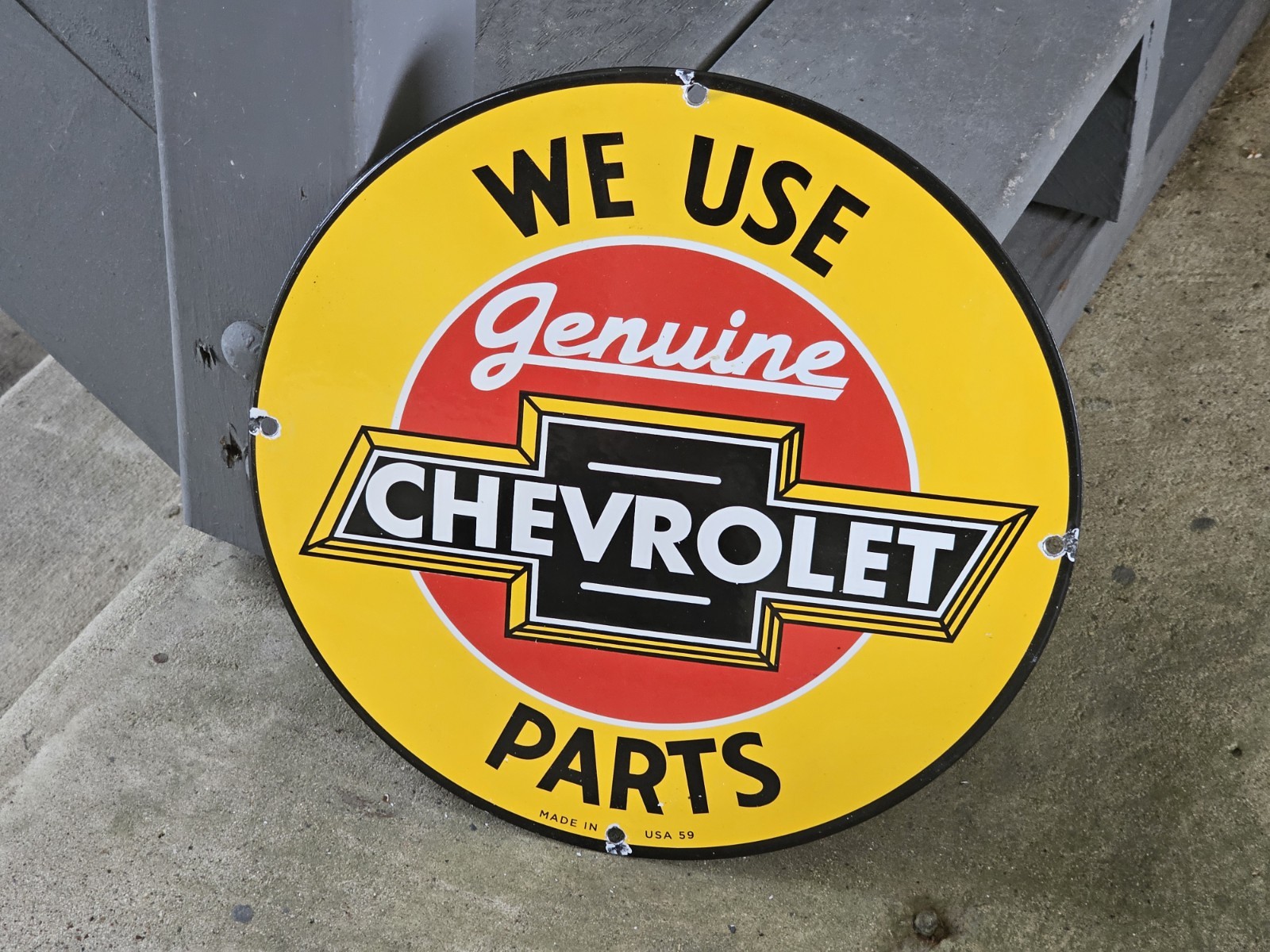 VINTAGE WE USE GENUINE CHEVROLET PARTS PORCELAIN SIGN 12″