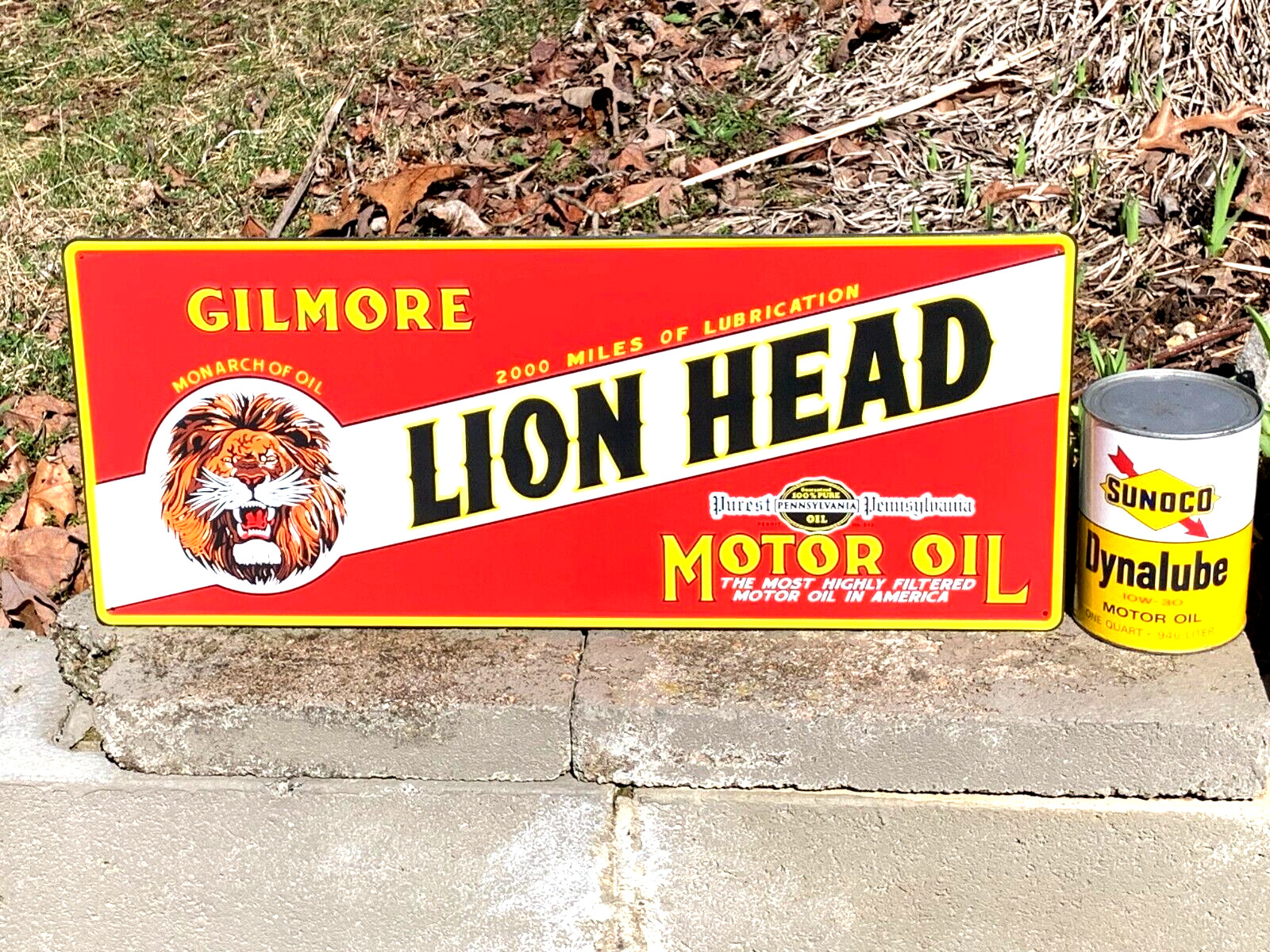 “LION HEAD MOTOR OIL” EMBOSSED METAL SIGN, (23.5″x 9.5″) EXCELLENT CONDITION