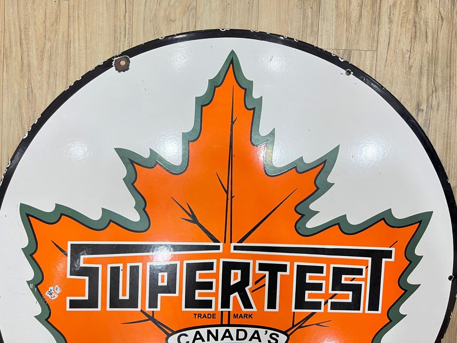 CANADA’S SUPERTEST 30 INCH DIAMETER PORCELAIN ENAMEL SIGN SINGLE SIDED