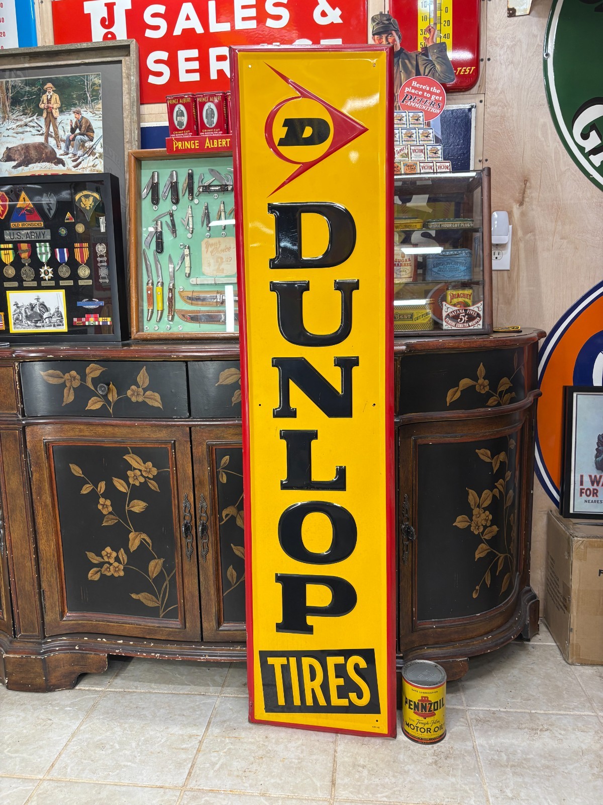 ORIGINAL 1965 “DUNLOP TIRES” LARGE EMBOSSED METAL DEALER SIGN, (60″x 14″) NICE