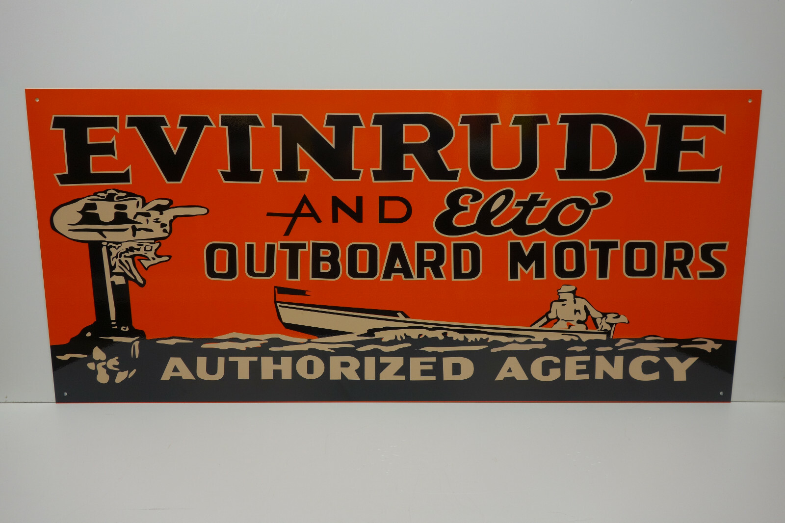 EVINRUDE AND ELTO MOTORS STEEL ENAMEL SIGN. 1/8″ THICK 40″ WIDE X 18″HIGH. NICE