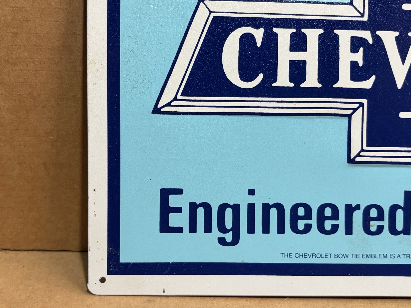 Chevrolet Powered for Performance Embossed Bowtie Metal Sign – 17-3/4″ x 11-3/4″