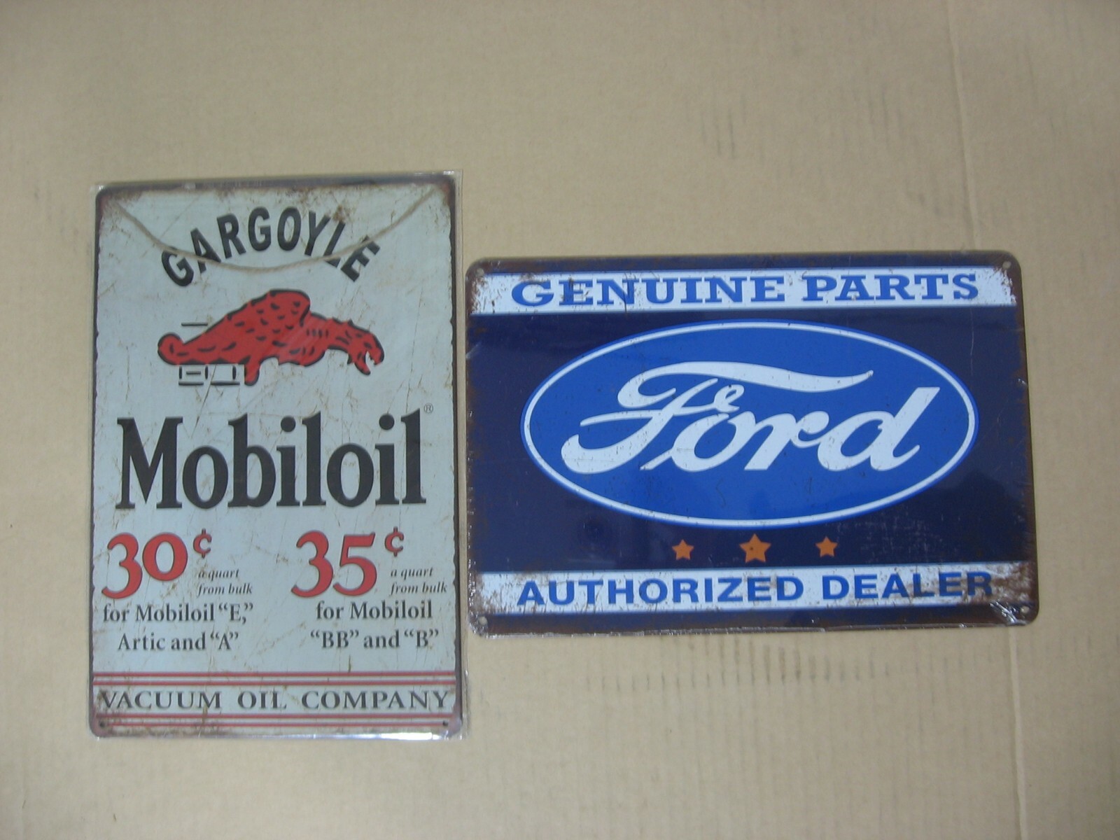 Genuine Ford parts and Mobil Gargoyle Gas Oil Tin Metal Garage Decor signs