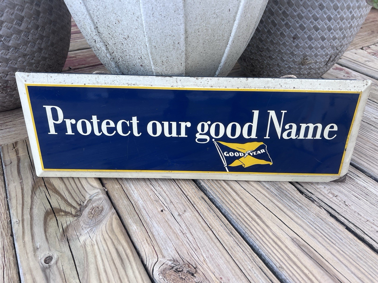 C. 1960 Good Year Tire Sign “Protect our good name”
