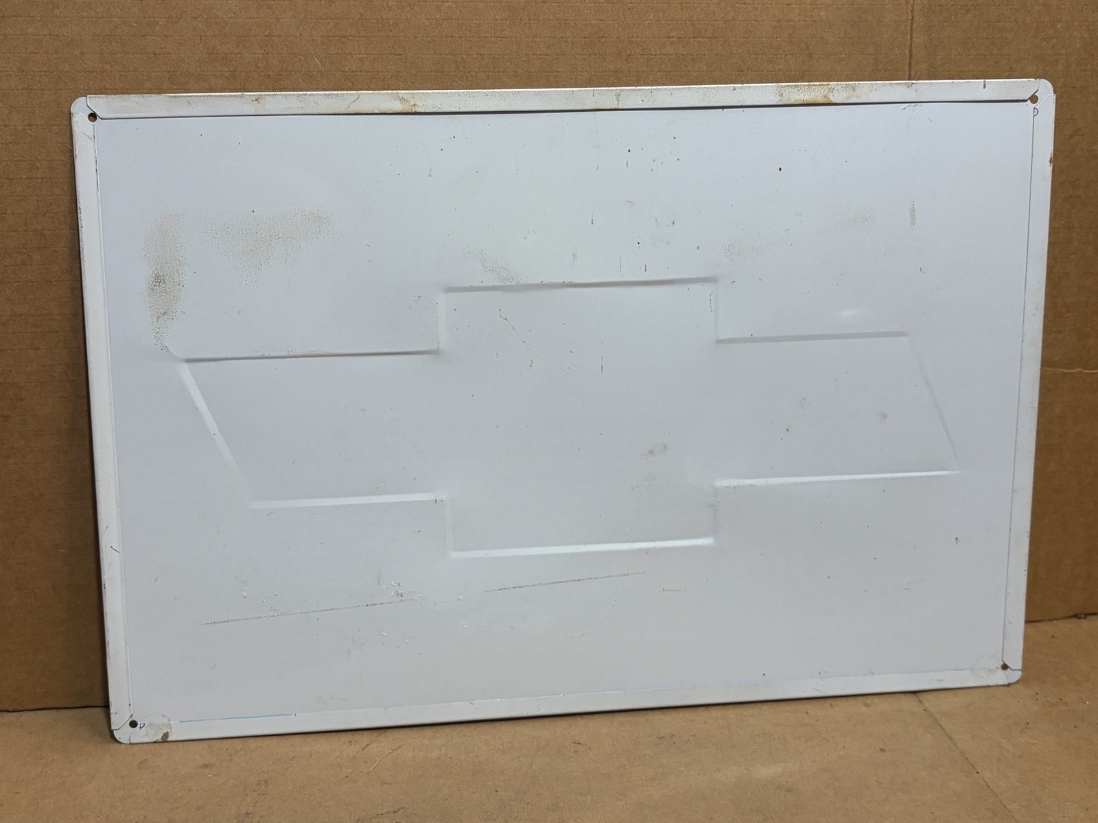 Chevrolet Powered for Performance Embossed Bowtie Metal Sign – 17-3/4″ x 11-3/4″