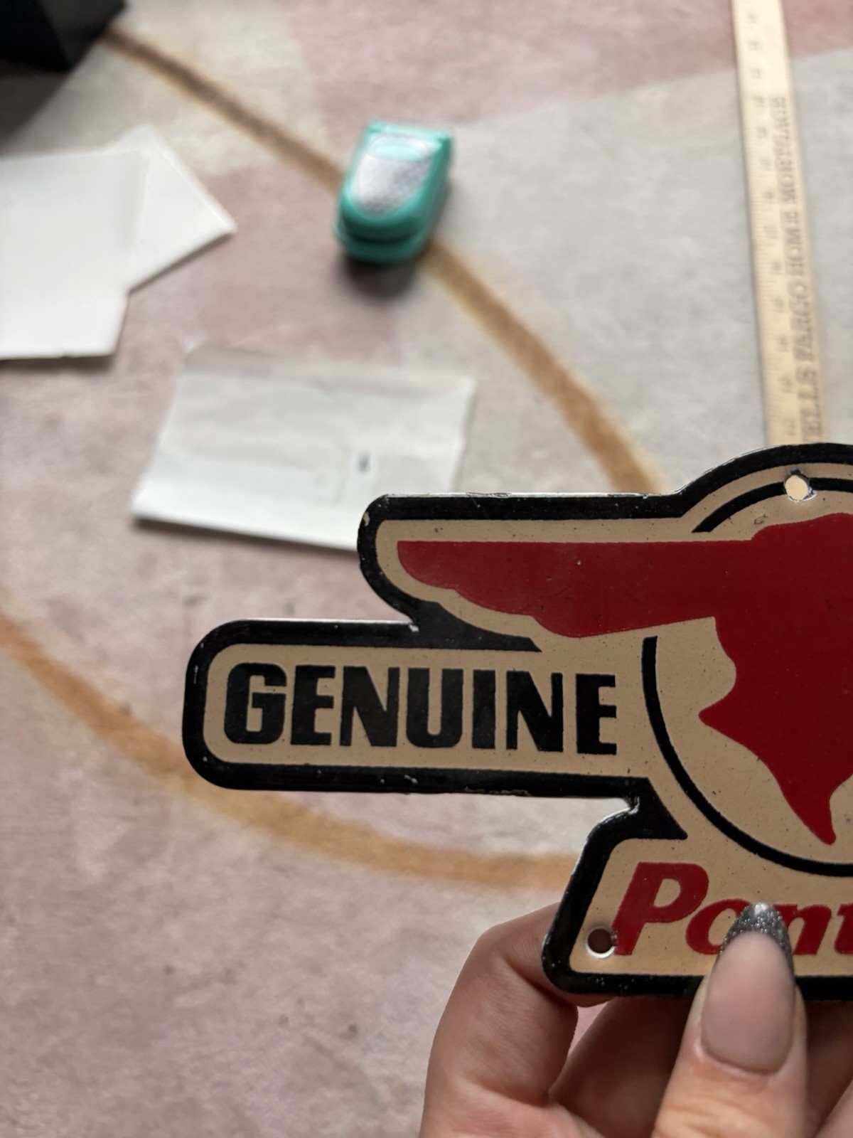 Porcelain Genuine Parts Pontiac Face Facing Right Sign