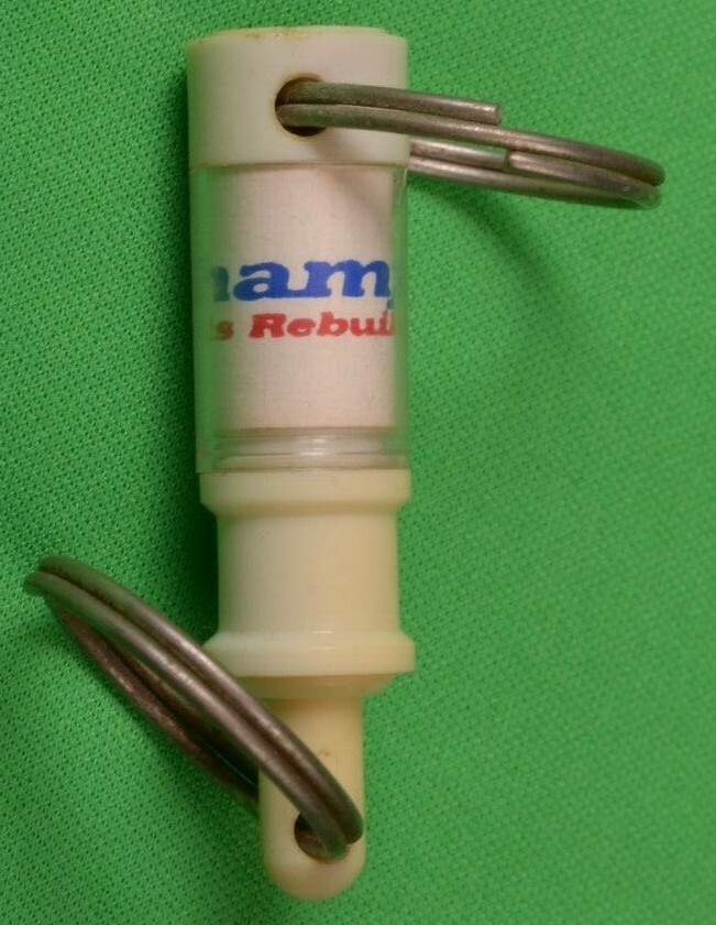 Vintage Champion Shock Key Chain ” Parts Rebuilder”