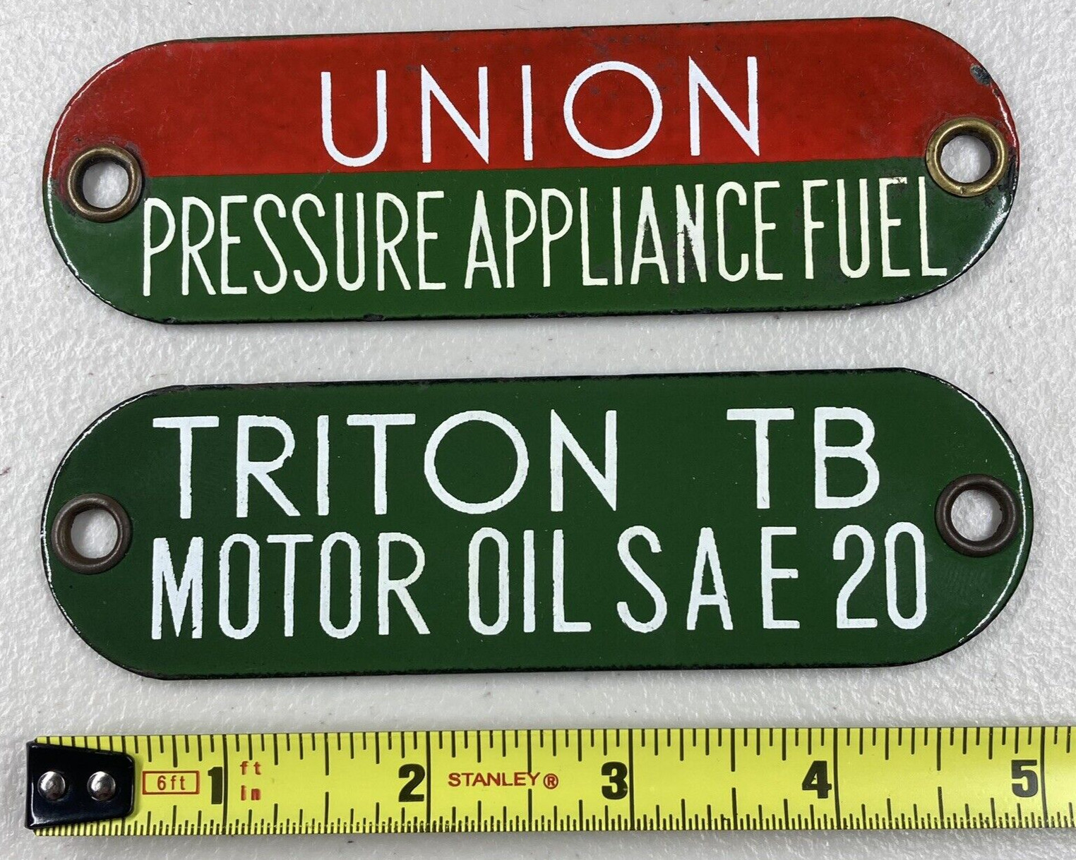 (2) Union Pressure Appliance Fuel & Triton 20 Porcelain Tag Gas Oil Sign Badge