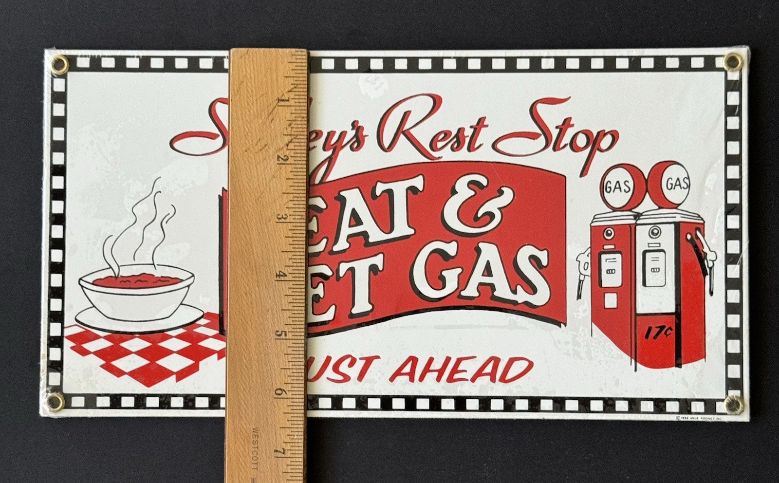 Vintage Ande Rooney Porcelain Sign Smiley’s Rest Stop 1996 Eat & Get Gas – NEW