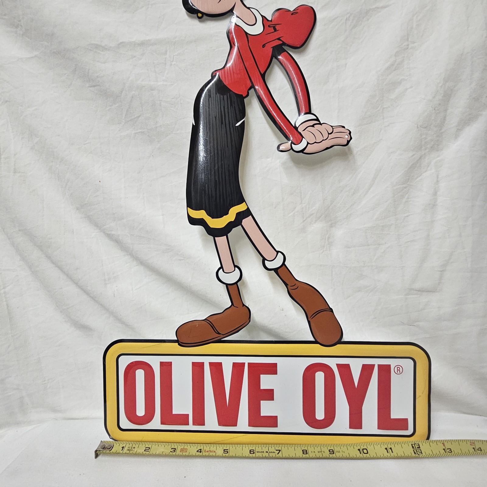 Vintage Style embossed Metal Sign featuring the iconic Olive Oyl From Popeye. BS