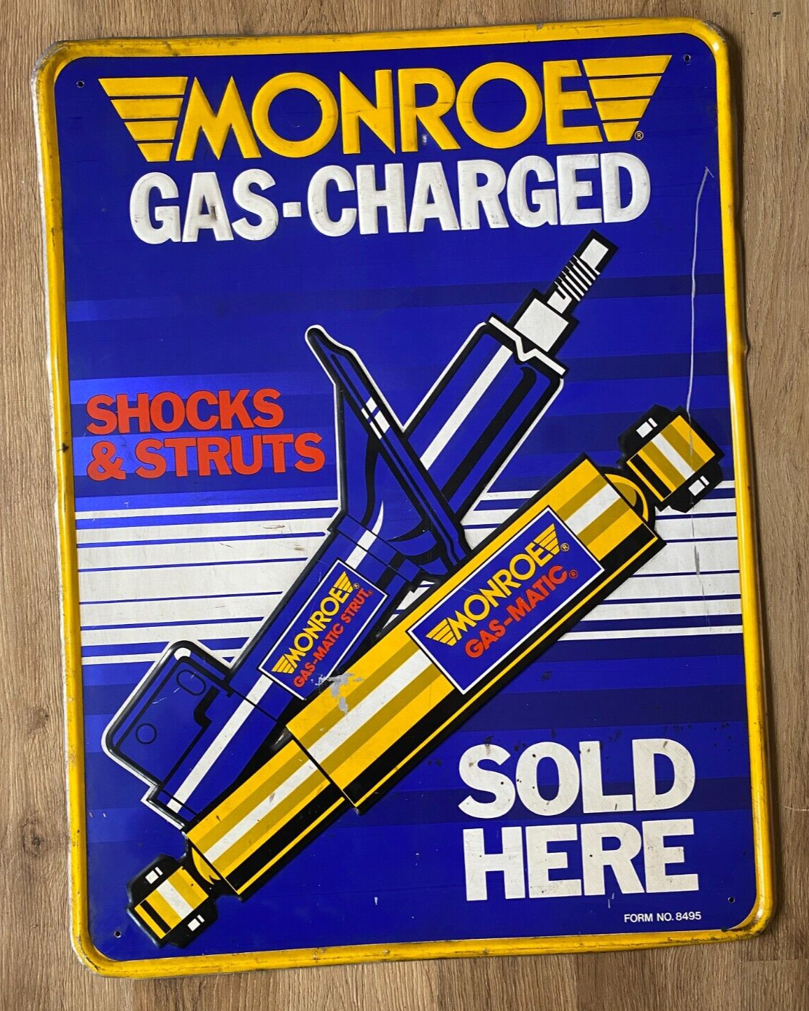 Original Colorful Embossed MONROE Shocks & Struts Gas Charged Metal Sign