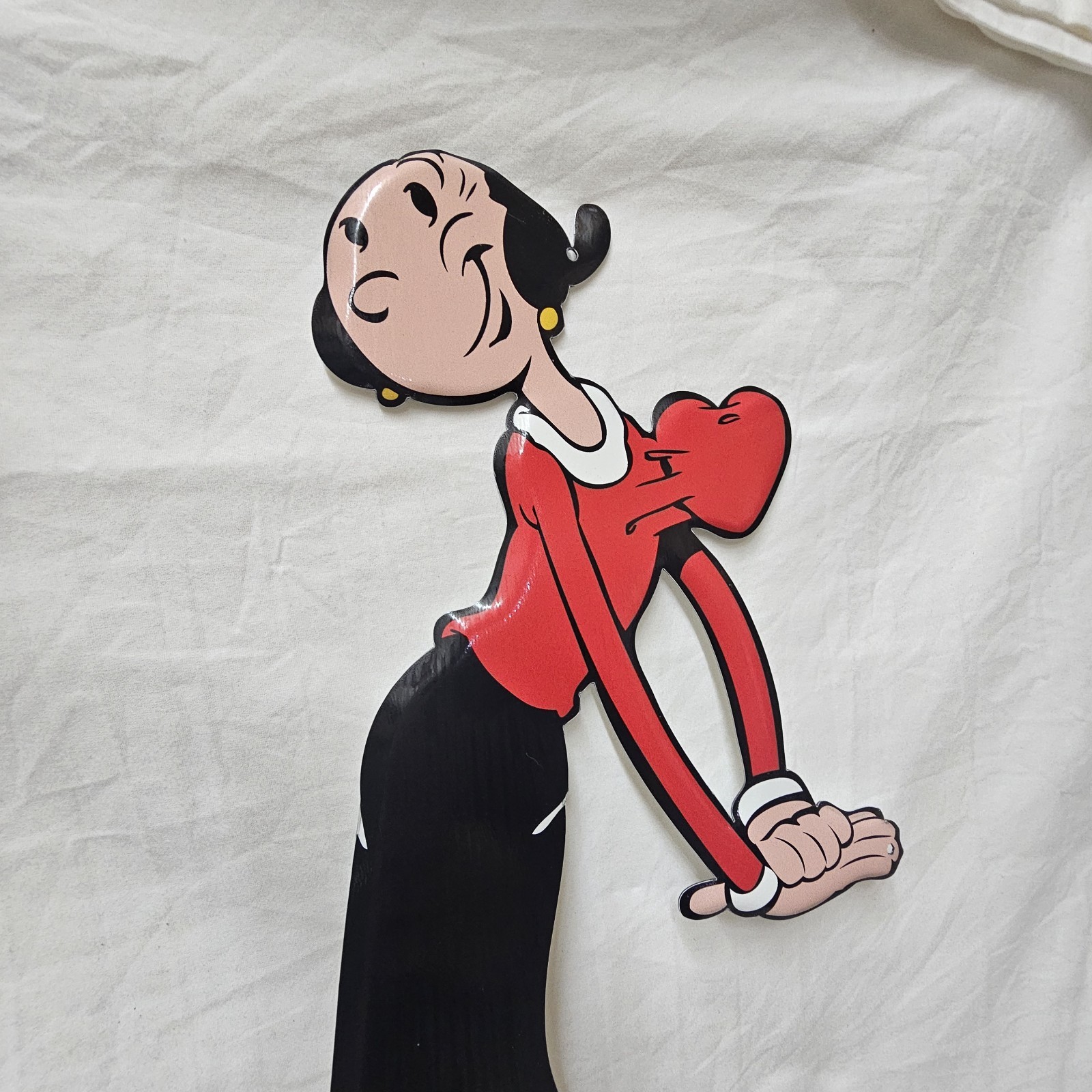 Vintage Style embossed Metal Sign featuring the iconic Olive Oyl From Popeye. BS