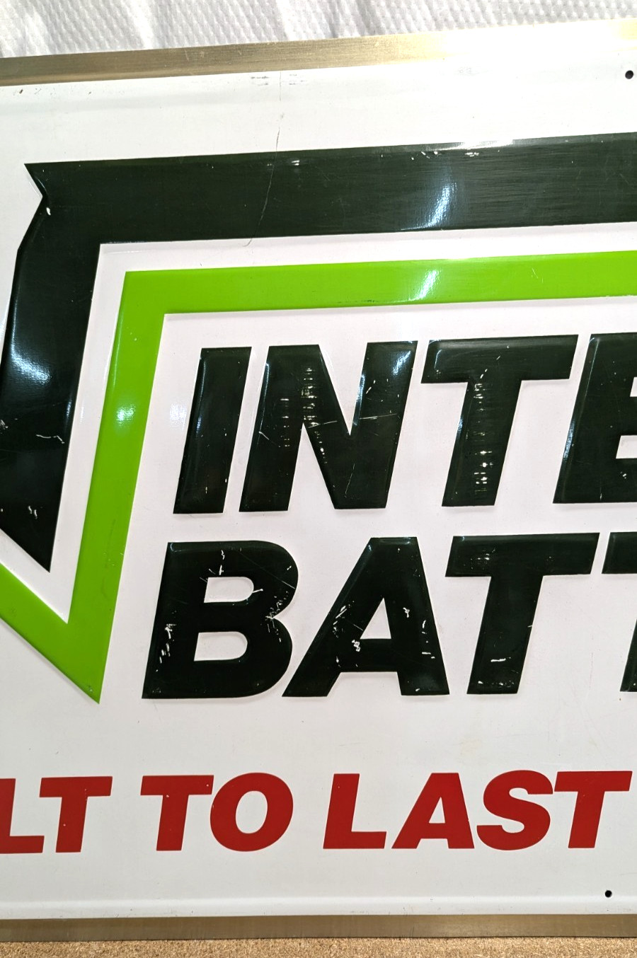 Large 60″ INTERSTATE BATTERIES embossed tin metal dealer sign