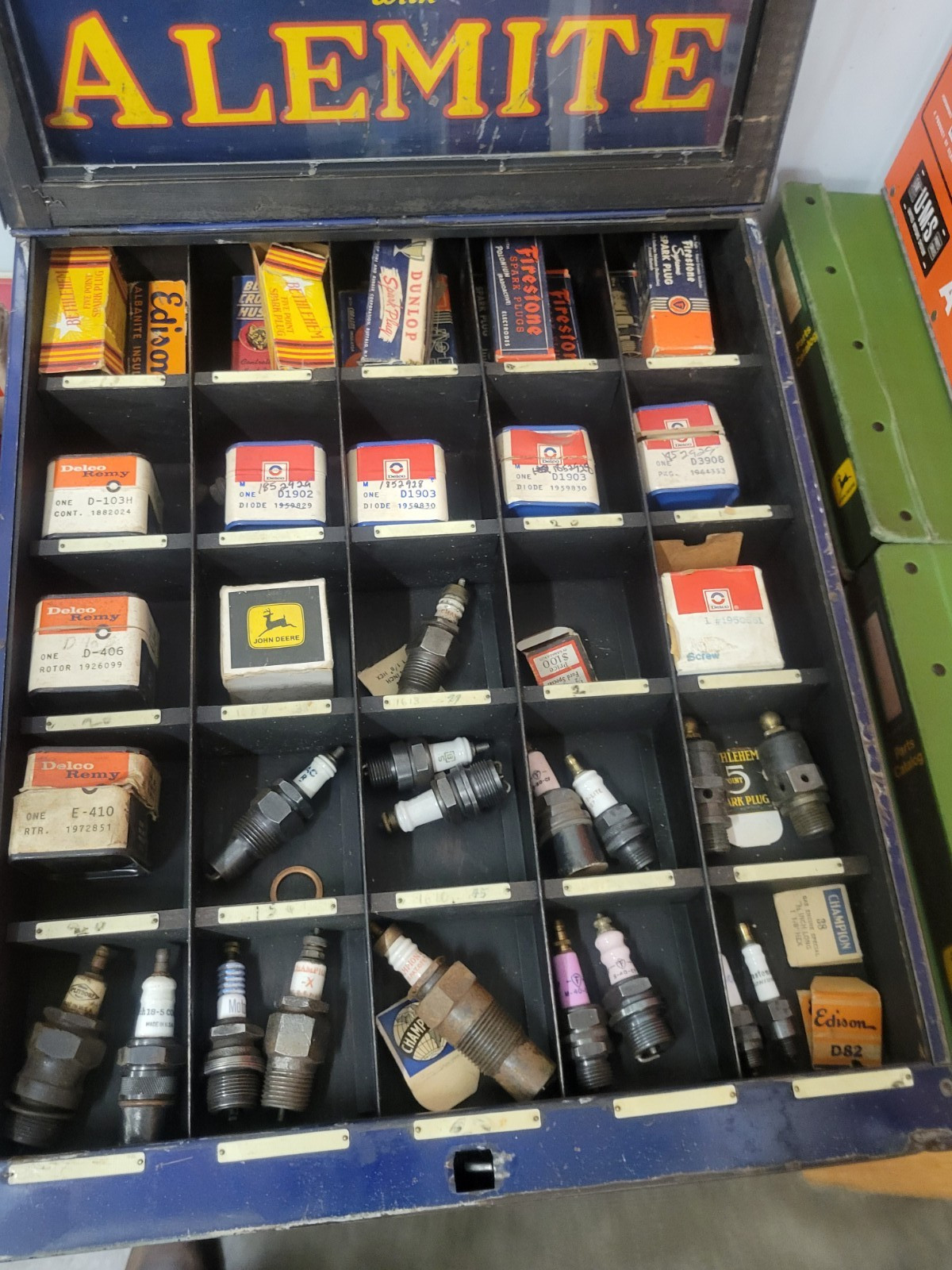 Alemite Grease Zerk Counter Cabinet with NOS Delco Ignition and spark plug Lot