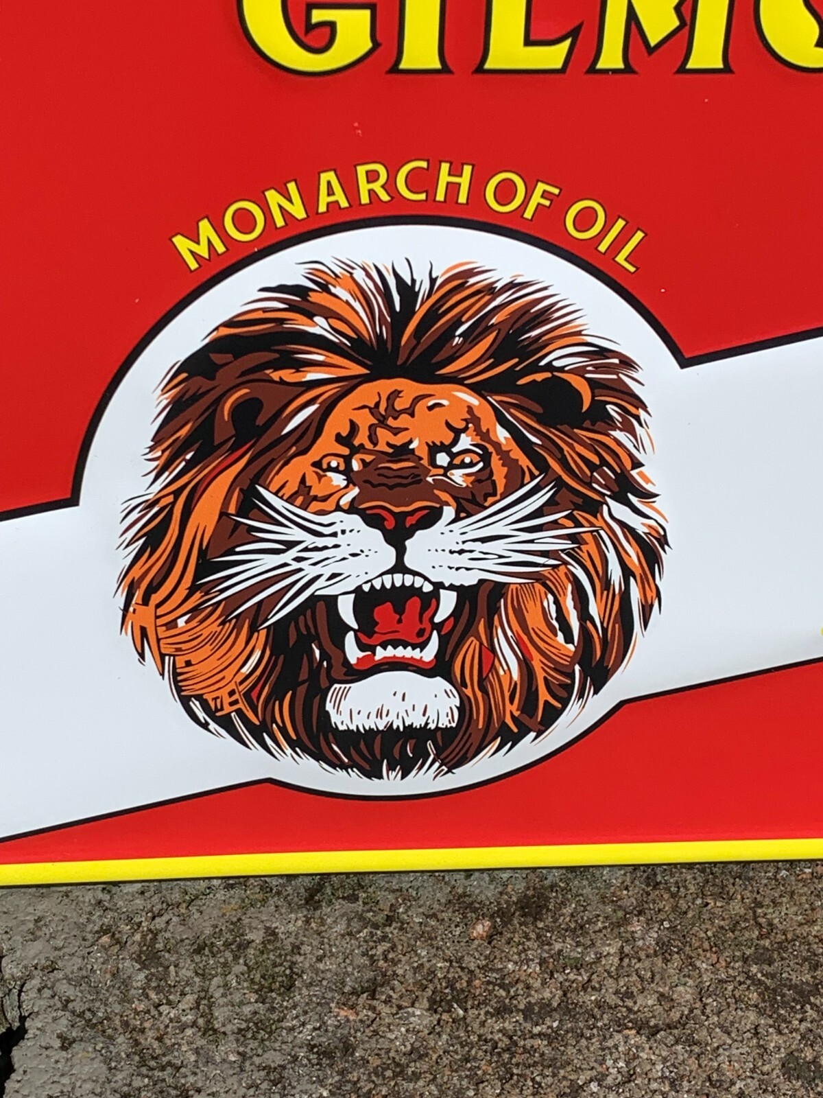 “LION HEAD MOTOR OIL” EMBOSSED METAL SIGN, (23.5″x 9.5″) EXCELLENT CONDITION