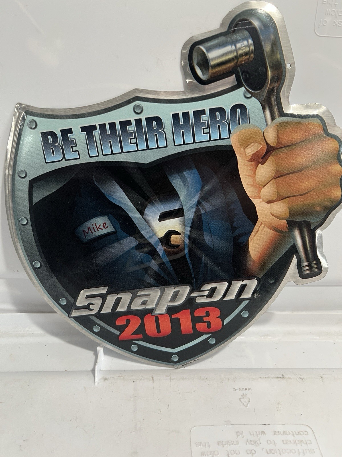 Snap On Metal Sign / Tin Sign 2013 “Be Their Hero” Approx 11”