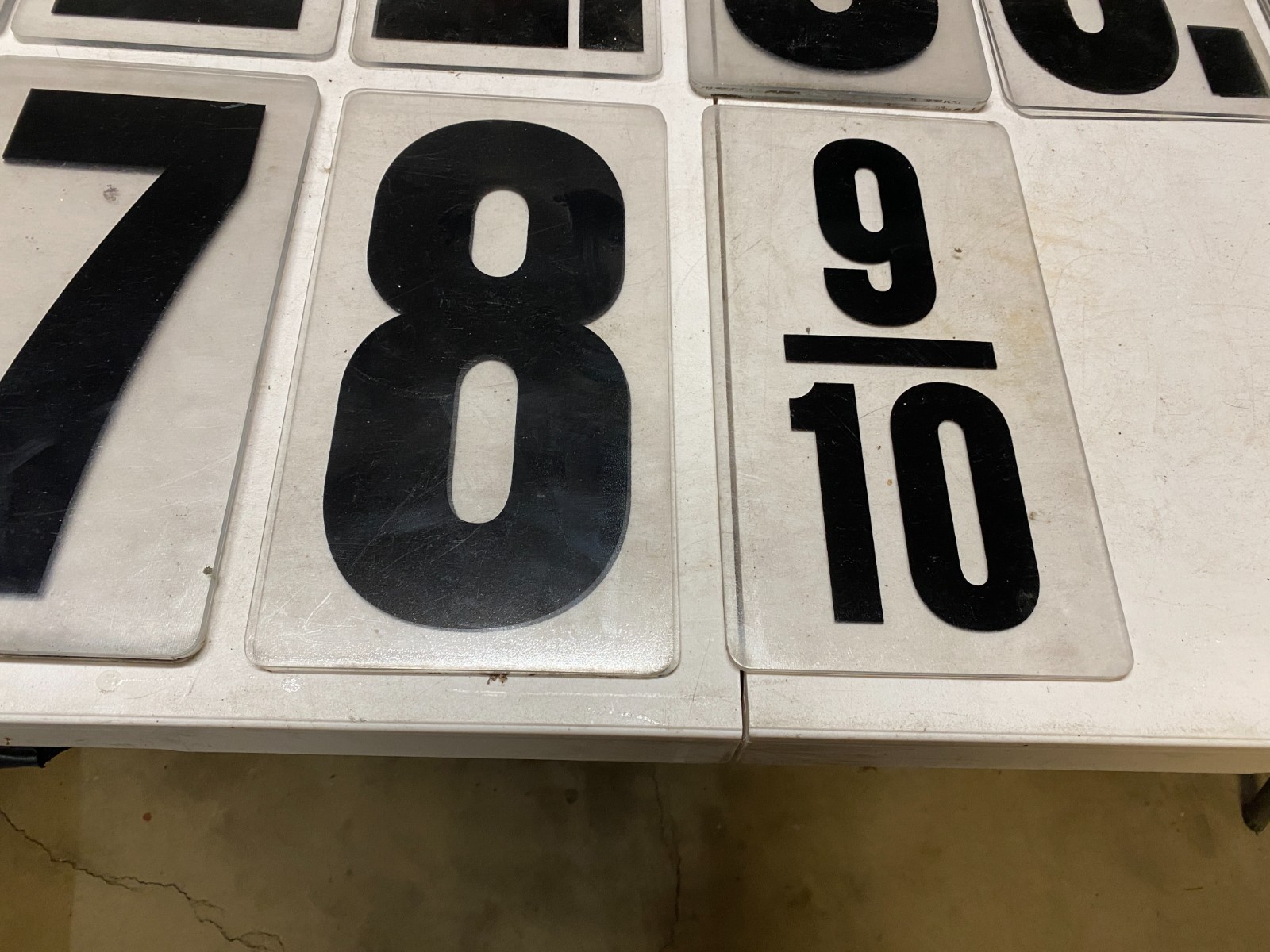 (32) vintage gas station clear acrylic background w/ black numbers 11”-12” tall