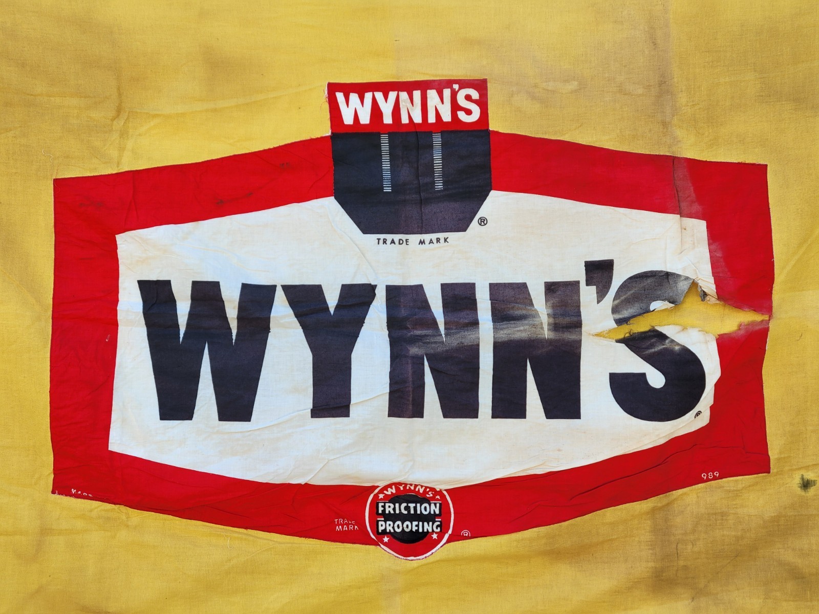 Vintage 1950s Wynn’s Friction Proofing Duck Cloth Racing Flag Sign Electro Cali
