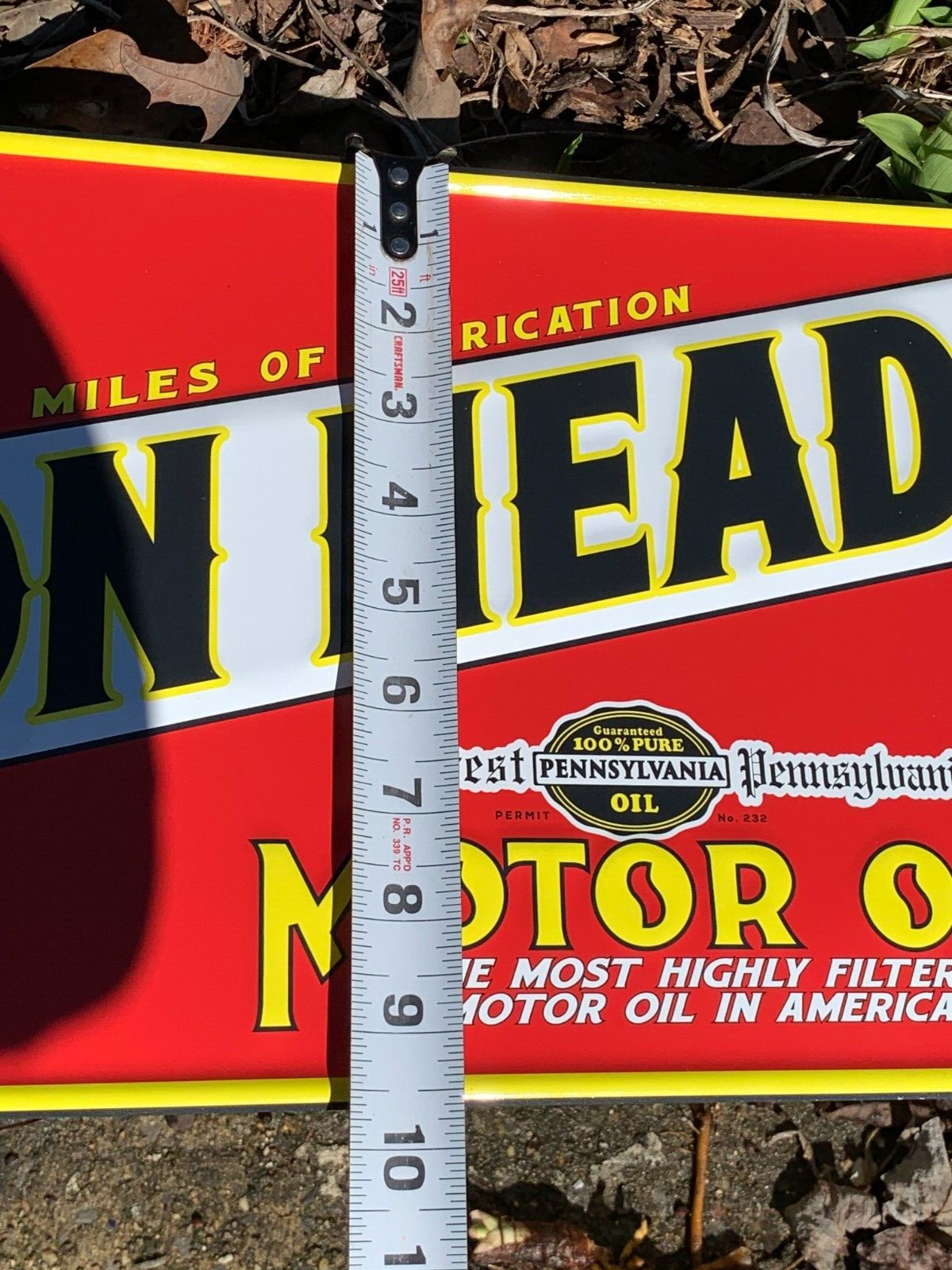 “LION HEAD MOTOR OIL” EMBOSSED METAL SIGN, (23.5″x 9.5″) EXCELLENT CONDITION
