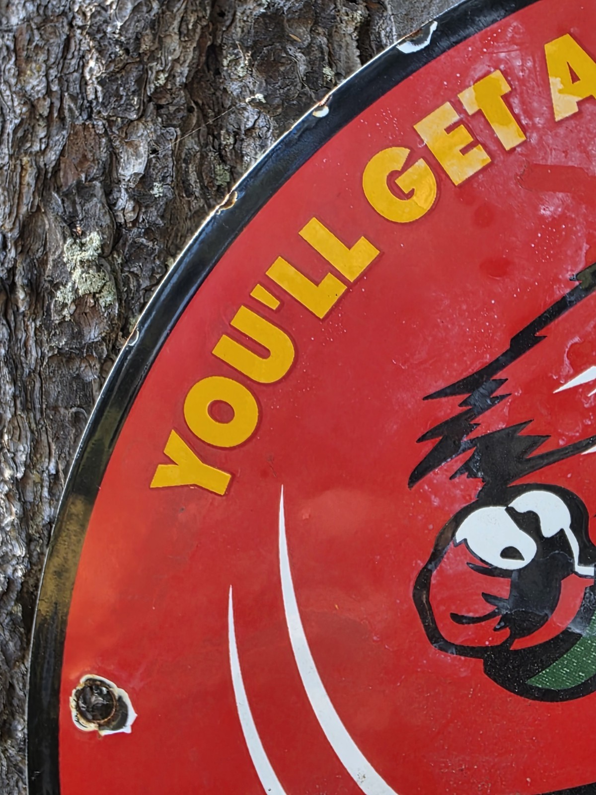 VINTAGE GILMORE PORCELAIN SIGN – YOU’LL GET A KICK OUTA RED LION GAS 12″