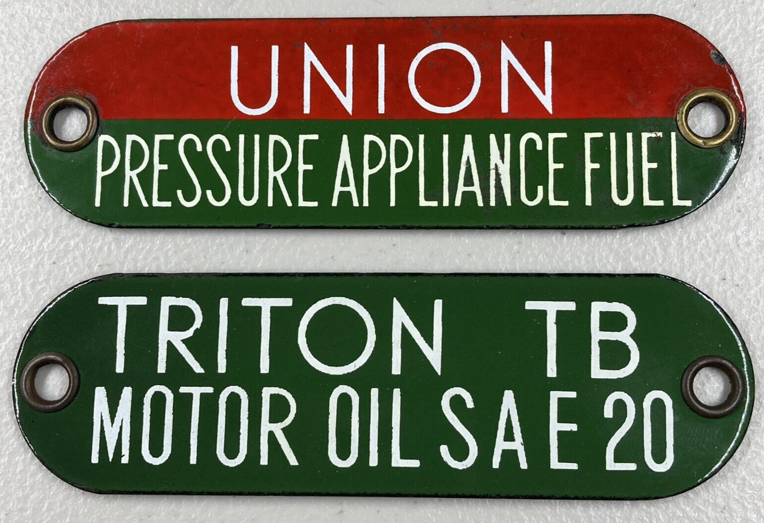 (2) Union Pressure Appliance Fuel & Triton 20 Porcelain Tag Gas Oil Sign Badge