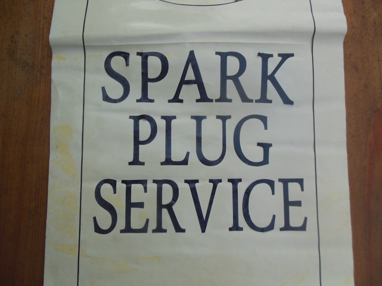 Vintage Champion Spark Plug Service Paper Vinyl Sign 26″ x 11″