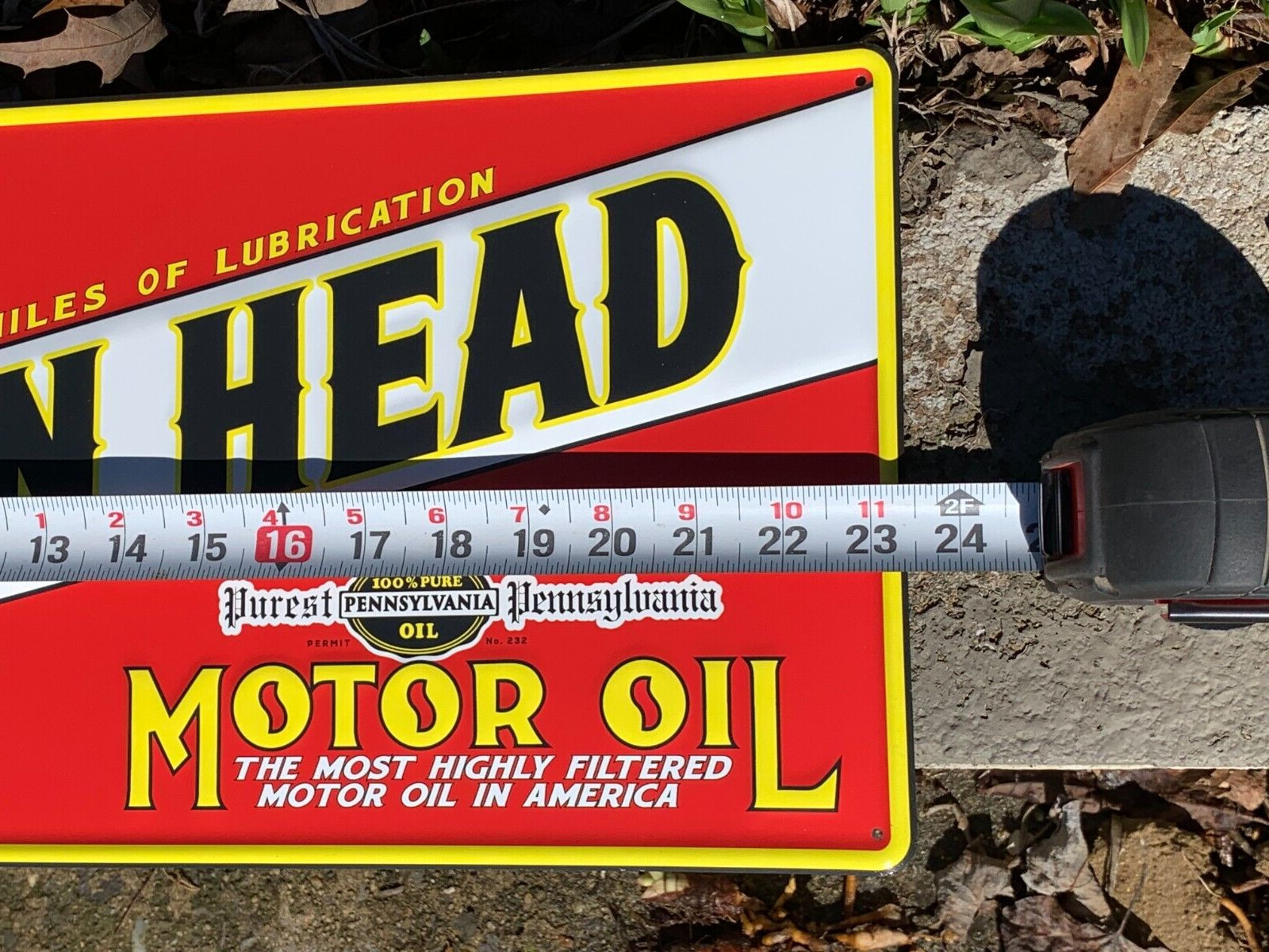 “LION HEAD MOTOR OIL” EMBOSSED METAL SIGN, (23.5″x 9.5″) EXCELLENT CONDITION