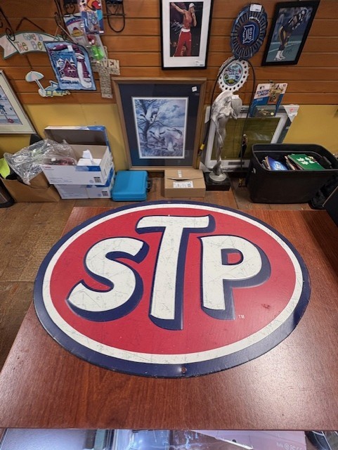 STP Tin Embossed Oval Sign 16″ x 11 1/8″ made by Open Road Brands Garage Sign