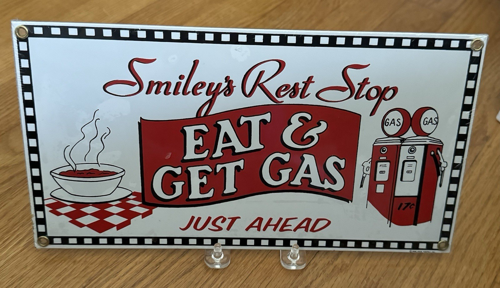 Vintage Ande Rooney Porcelain Sign Smiley’s Rest Stop 1996 Eat & Get Gas – NEW
