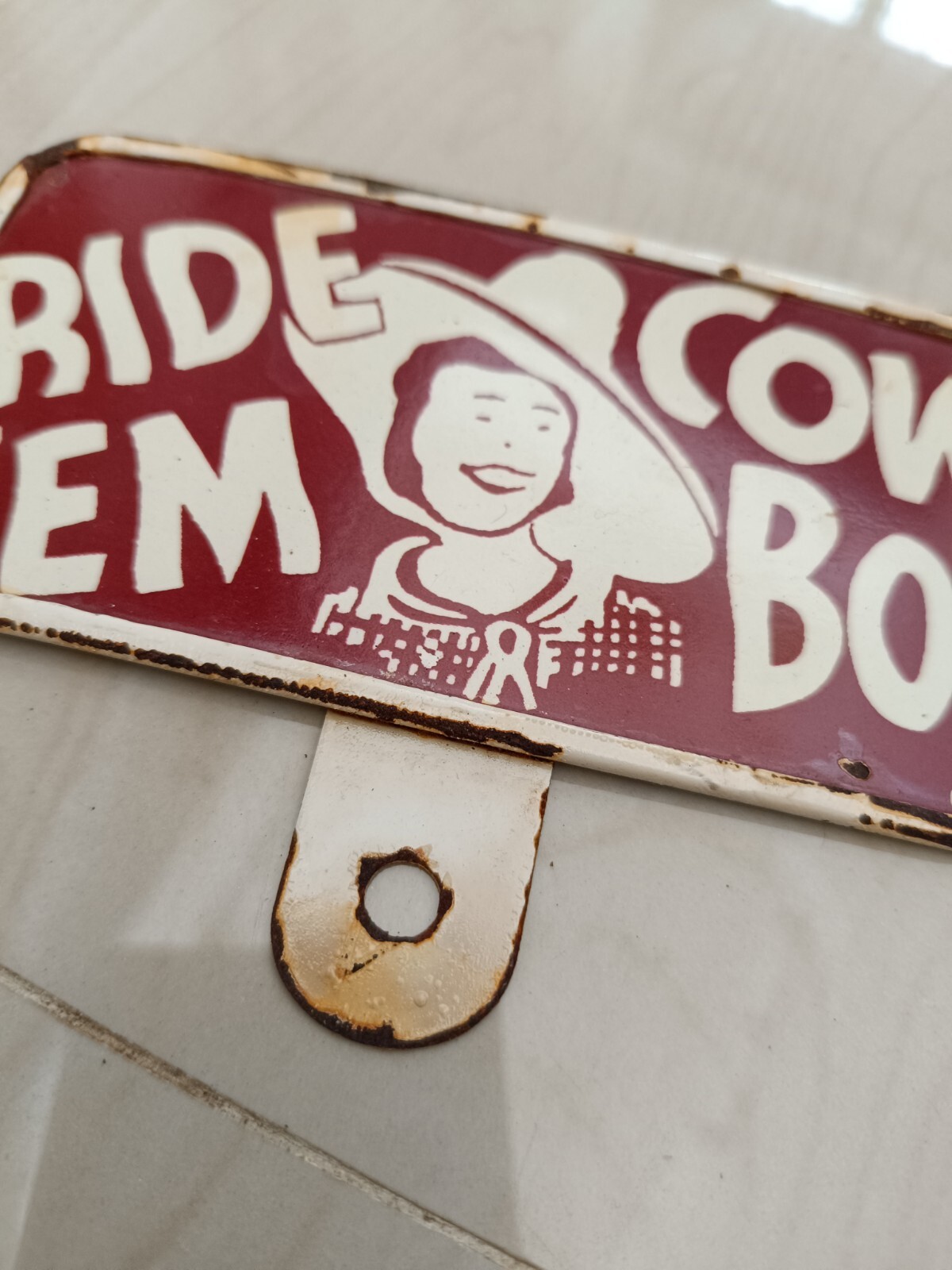 1940’S 1950’S – ” RIDE ‘EM COWBOY ” LICENSE PLATE TOPPER SIGN