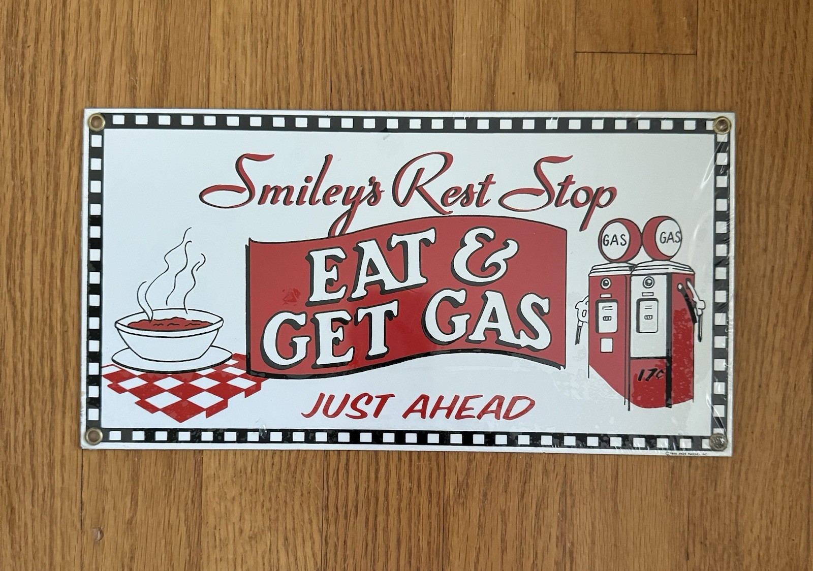 Vintage Ande Rooney Porcelain Sign Smiley’s Rest Stop 1996 Eat & Get Gas – NEW