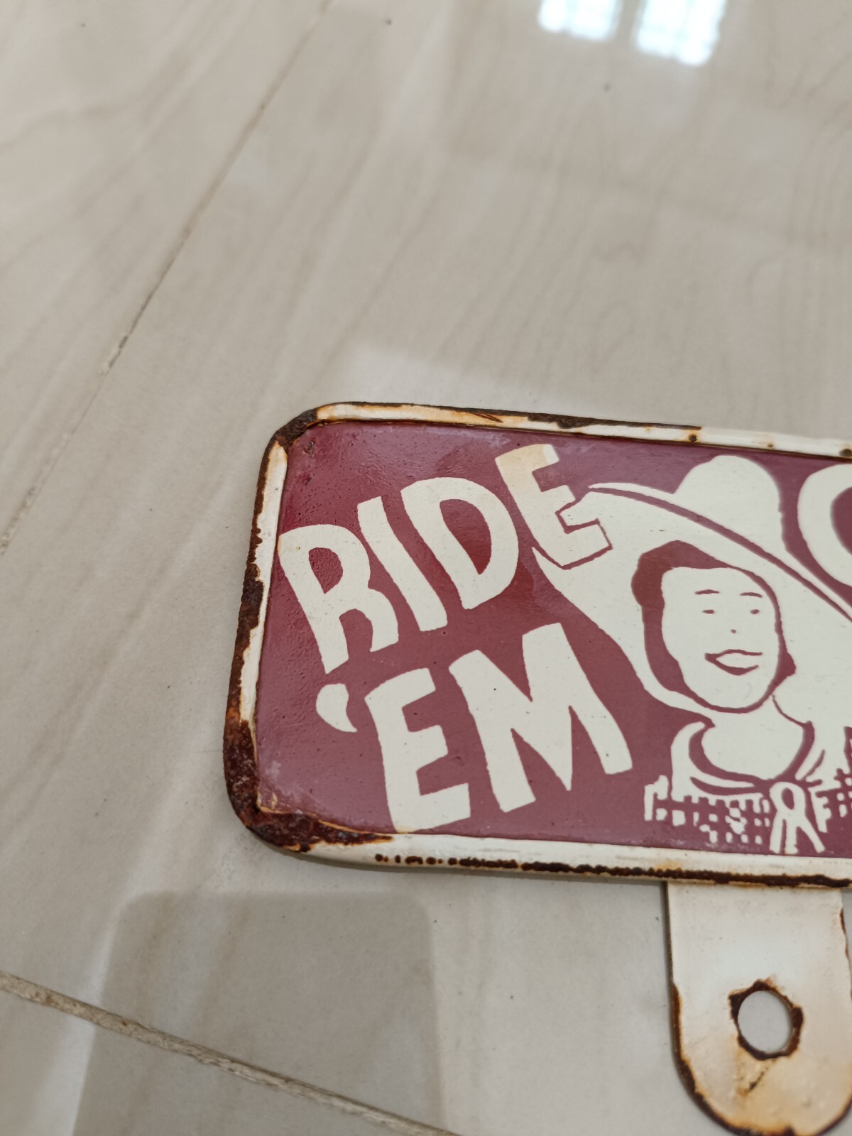 1940’S 1950’S – ” RIDE ‘EM COWBOY ” LICENSE PLATE TOPPER SIGN