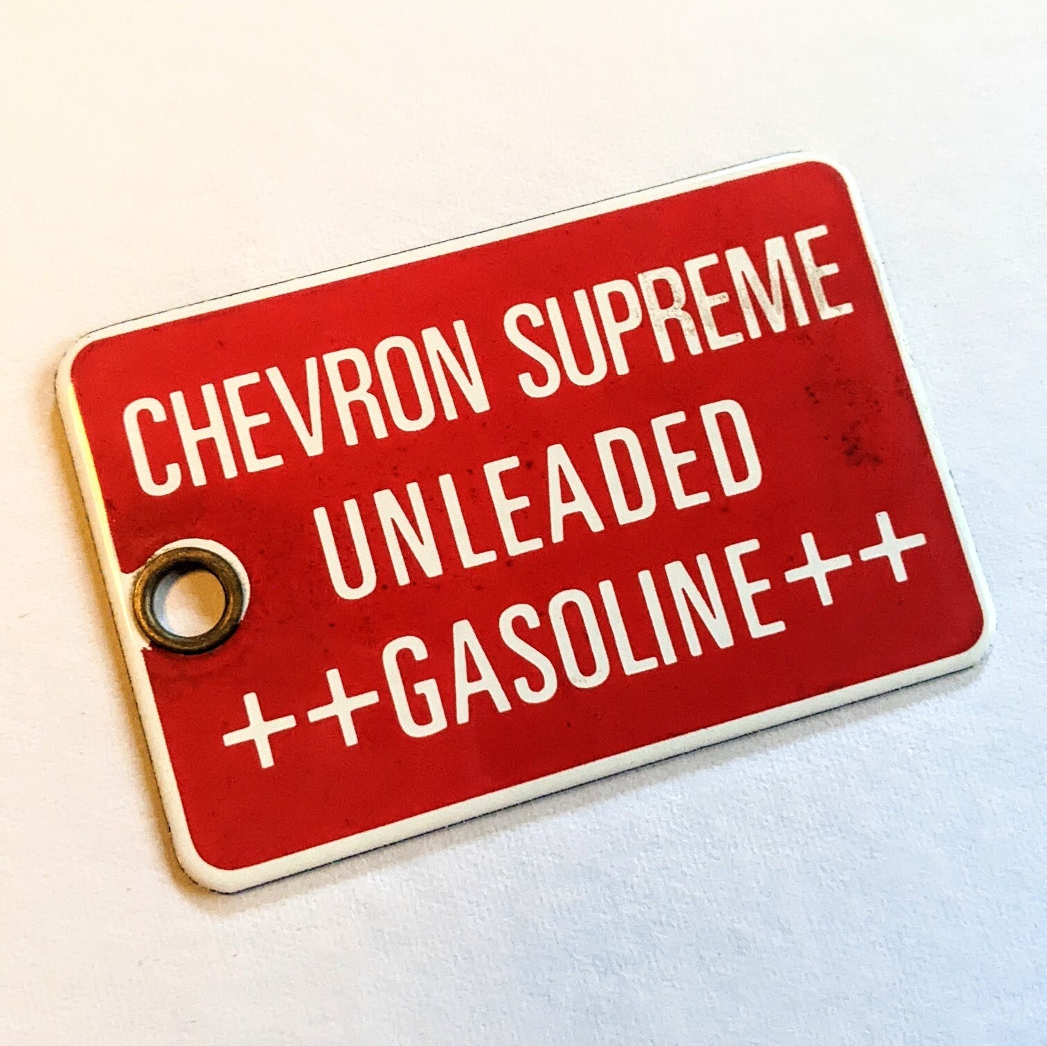 Vintage CHEVRON SUPREME UNLEADED GASOLINE Porcelain Tag