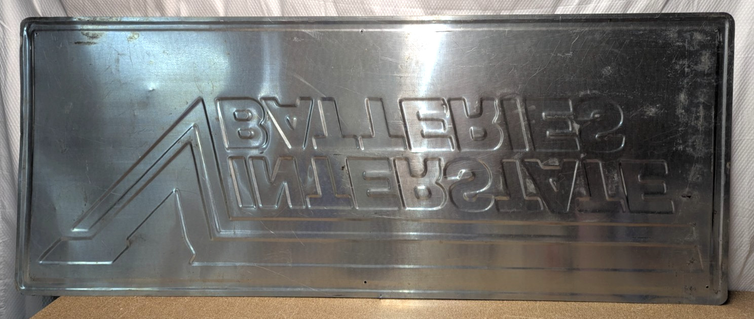 Large 60″ INTERSTATE BATTERIES embossed tin metal dealer sign