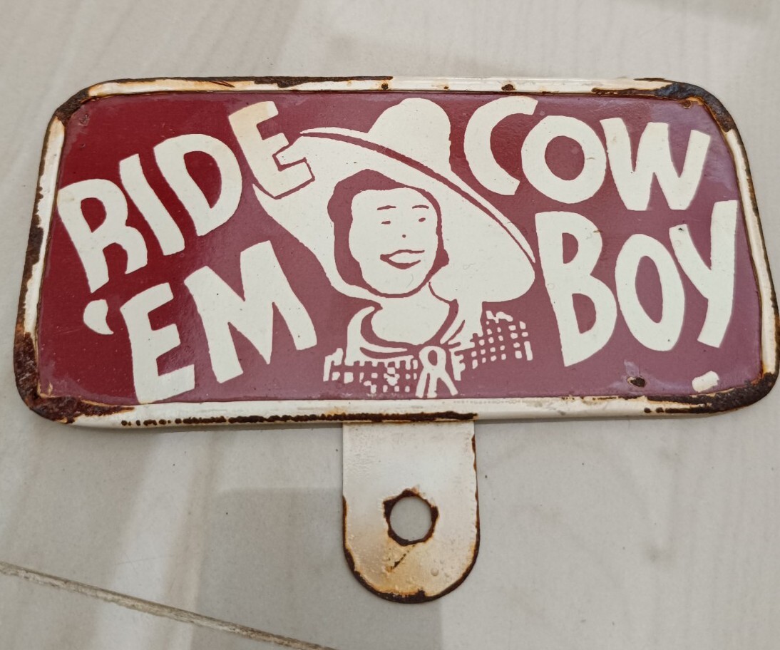 1940’S 1950’S – ” RIDE ‘EM COWBOY ” LICENSE PLATE TOPPER SIGN