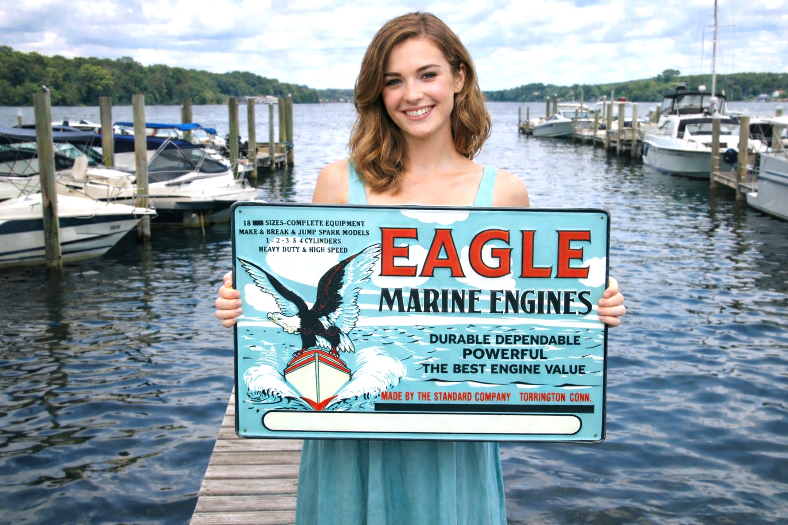 “EAGLE MARINE ENGINES” EMBOSSED METAL SIGN W/ PRESTIGE DEALER SIGN, (20″x 14″)