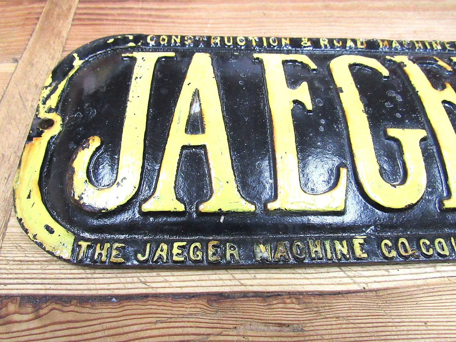 ORIGINAL CAST IRON BUILDERS PLATE “JAEGER” CONSTRUCTION & ROAD MACHINERY EMBLEM