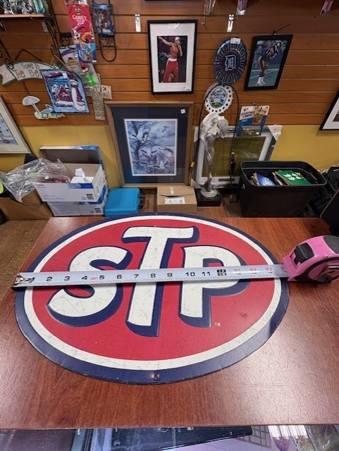 STP Tin Embossed Oval Sign 16″ x 11 1/8″ made by Open Road Brands Garage Sign