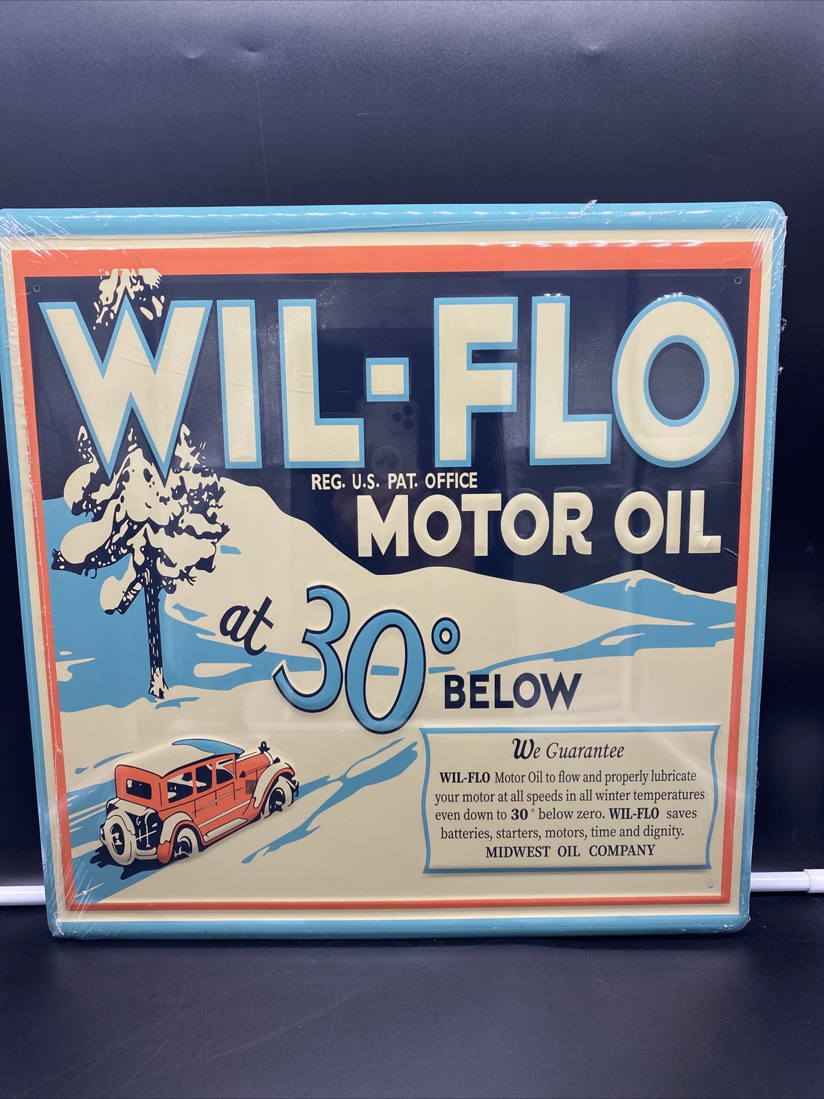 VINTAGE “WIL-FLO MOTOR OIL” PAINTED EMBOSSED METAL 17.5×17.5 INCHES